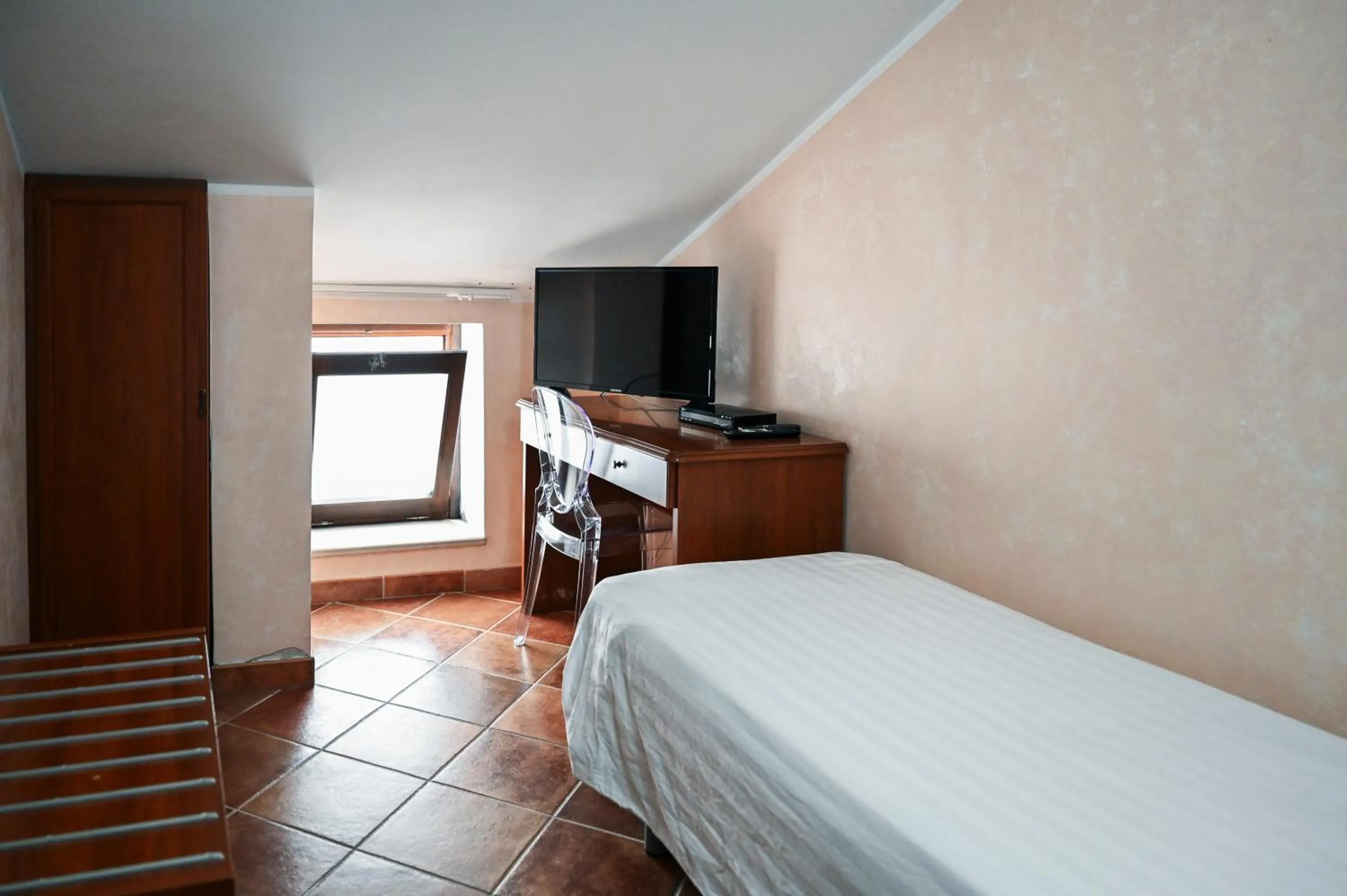 Bed in Hotel Palazzo Krataiis