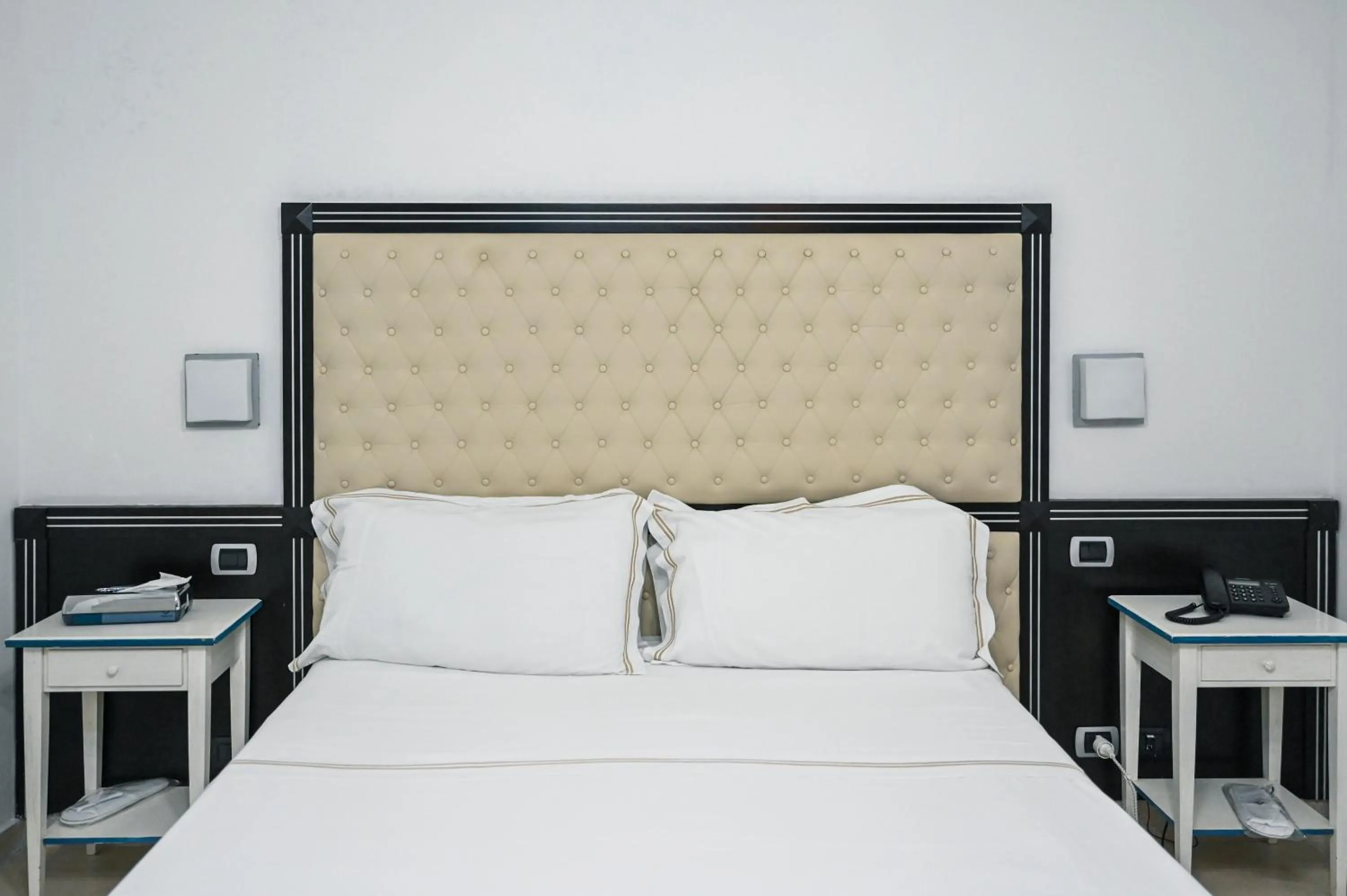 Bed in Hotel Palazzo Krataiis