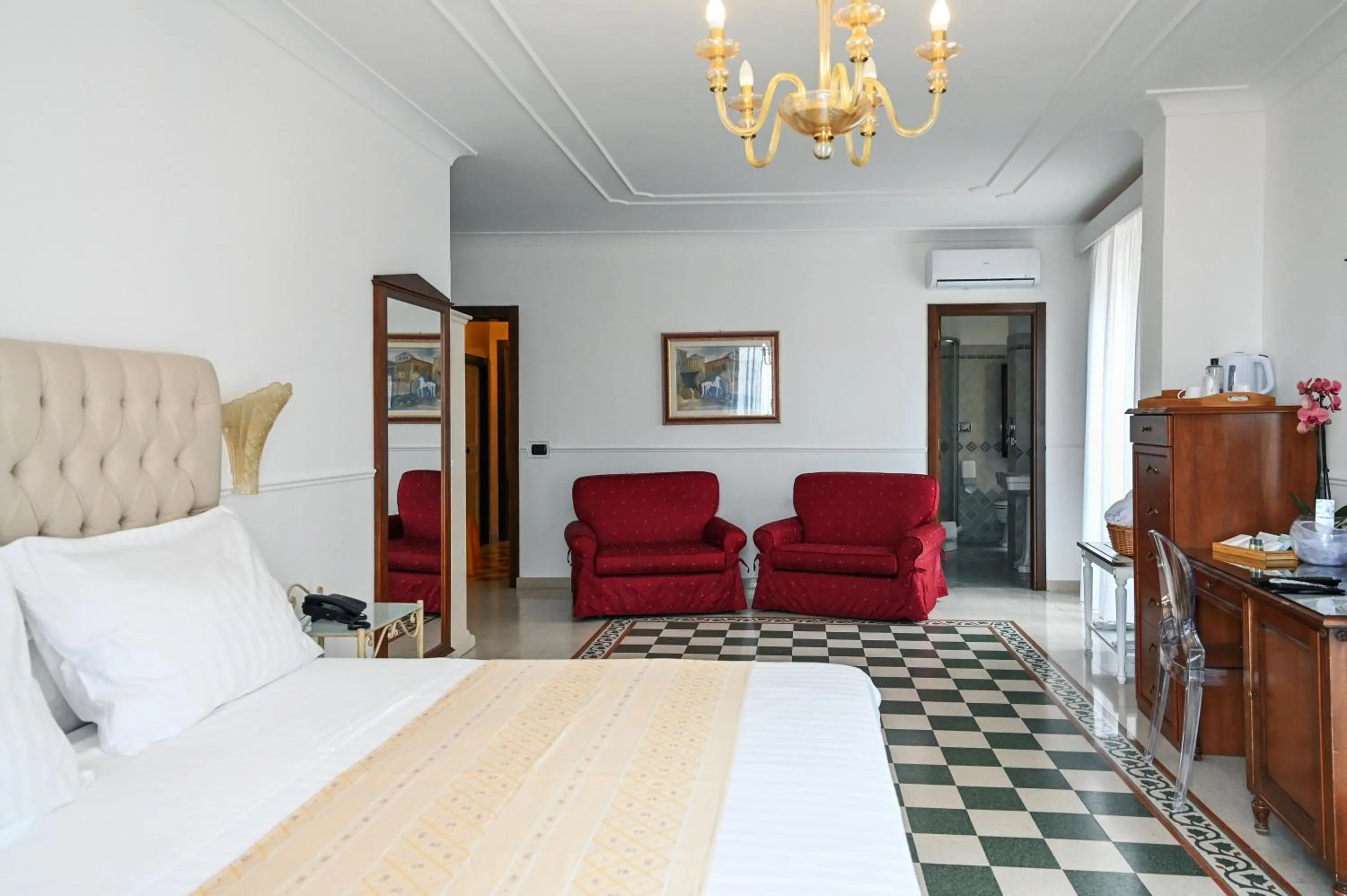 Bed in Hotel Palazzo Krataiis