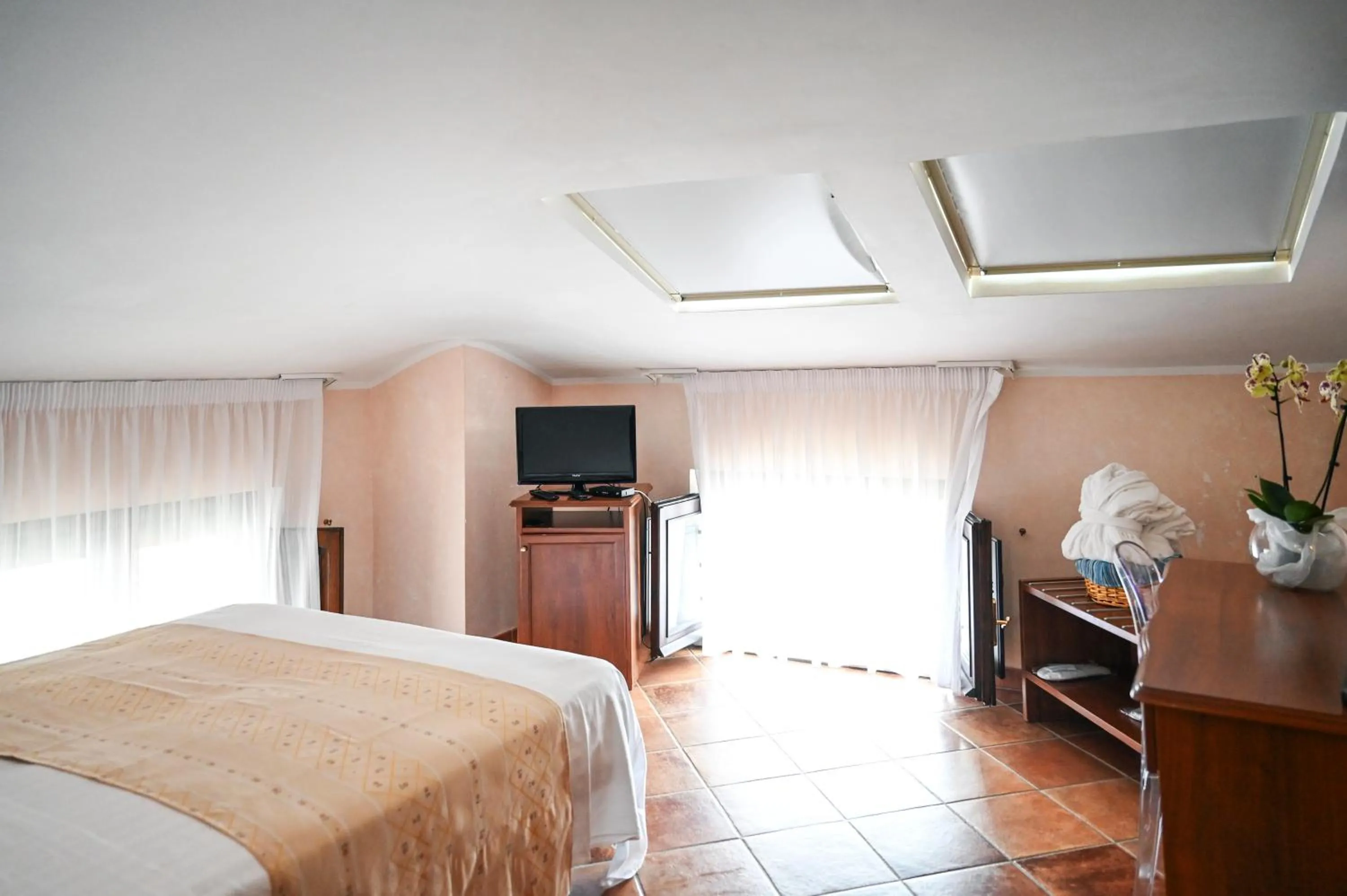 Bed in Hotel Palazzo Krataiis