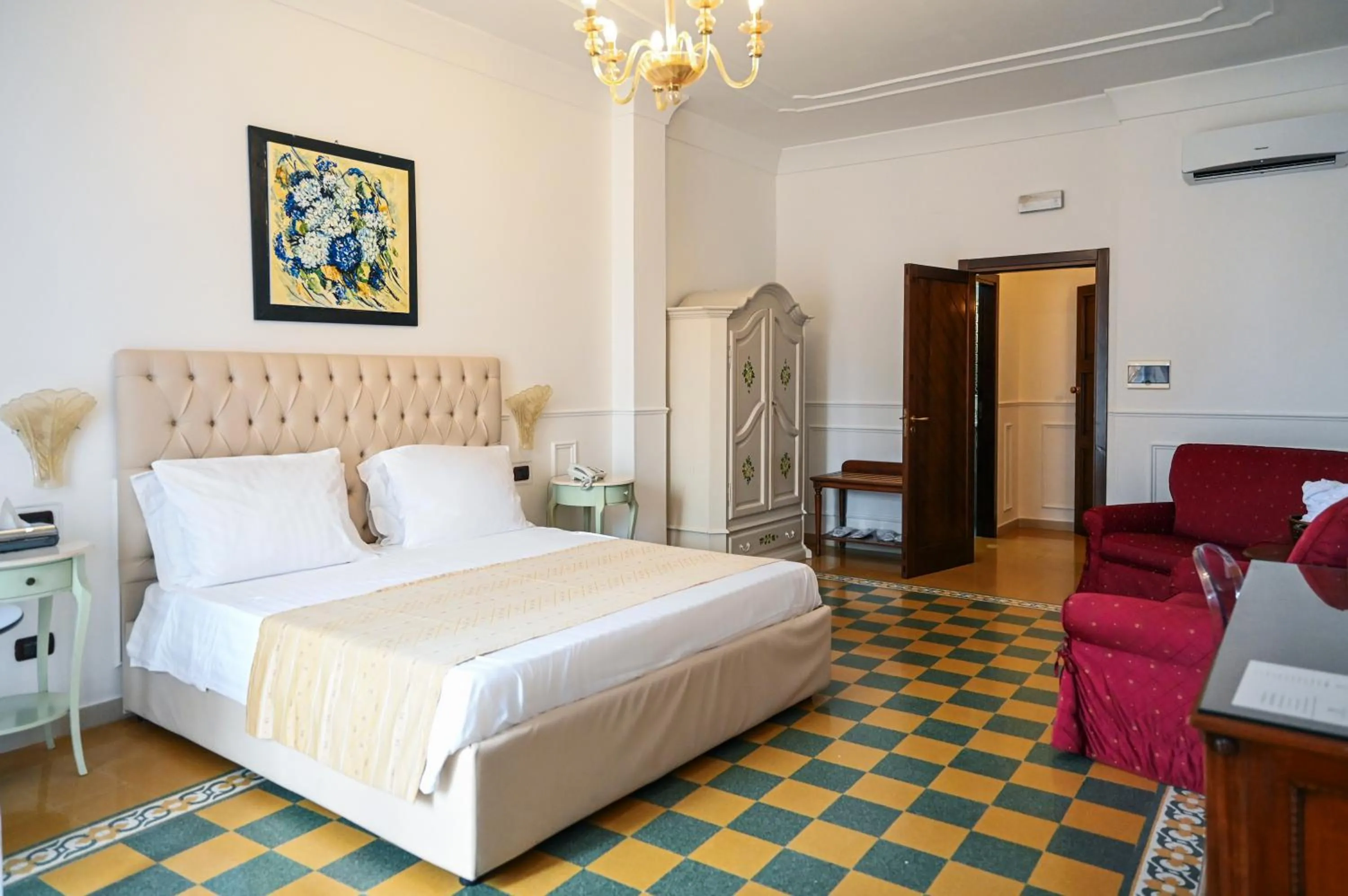Bed in Hotel Palazzo Krataiis