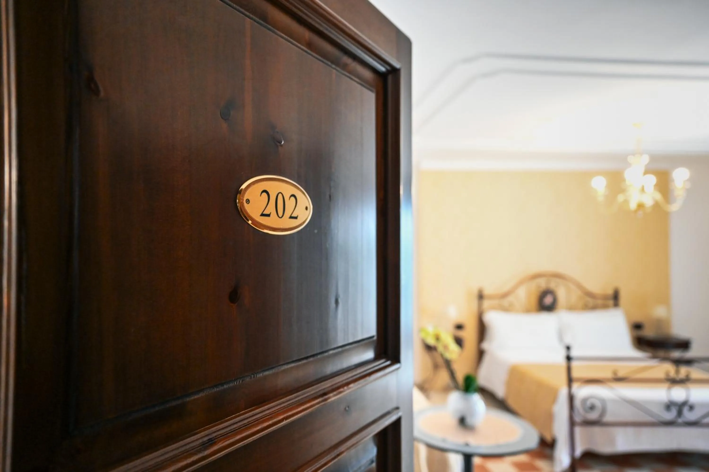 Bed in Hotel Palazzo Krataiis