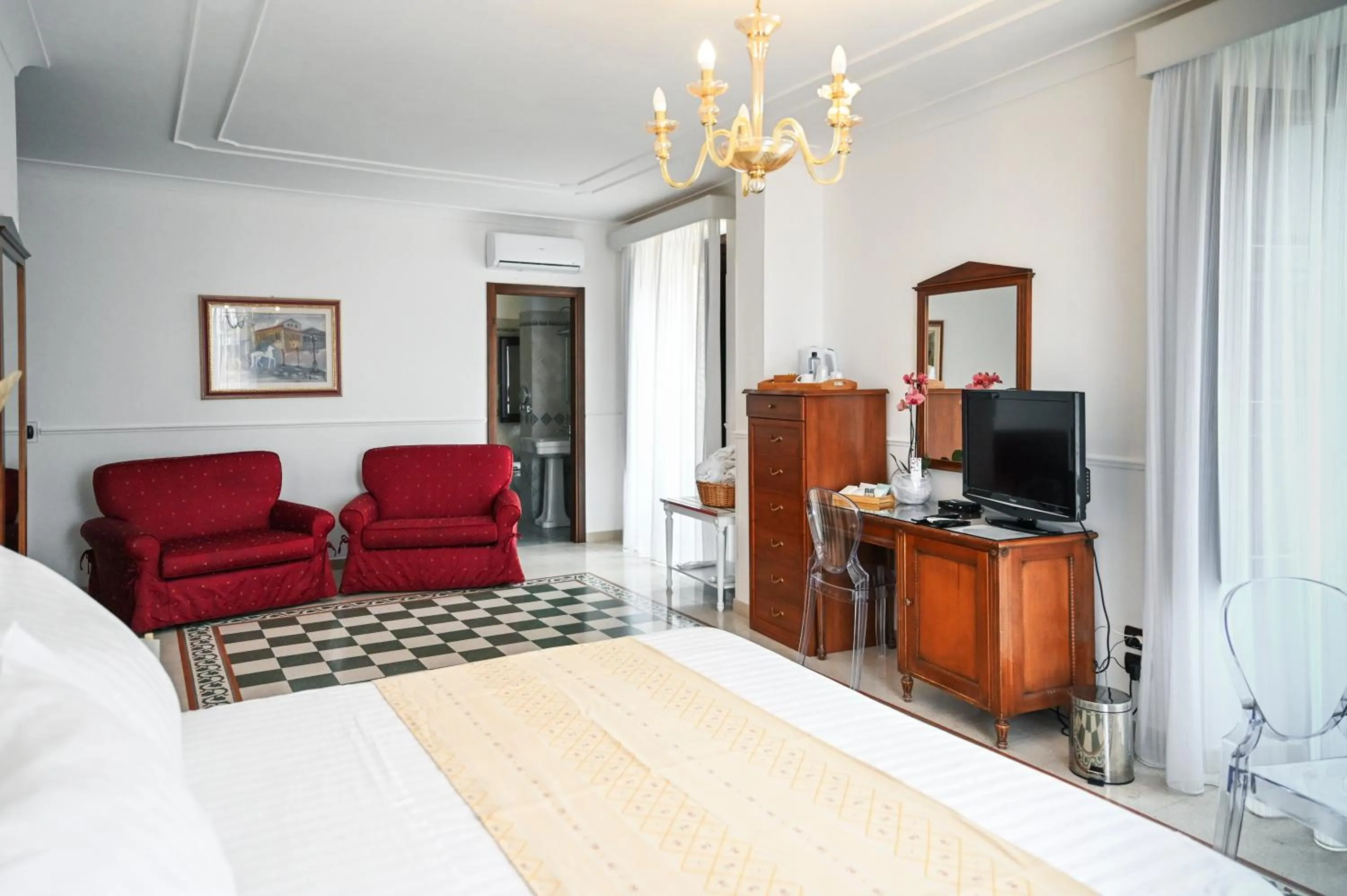 Bed in Hotel Palazzo Krataiis