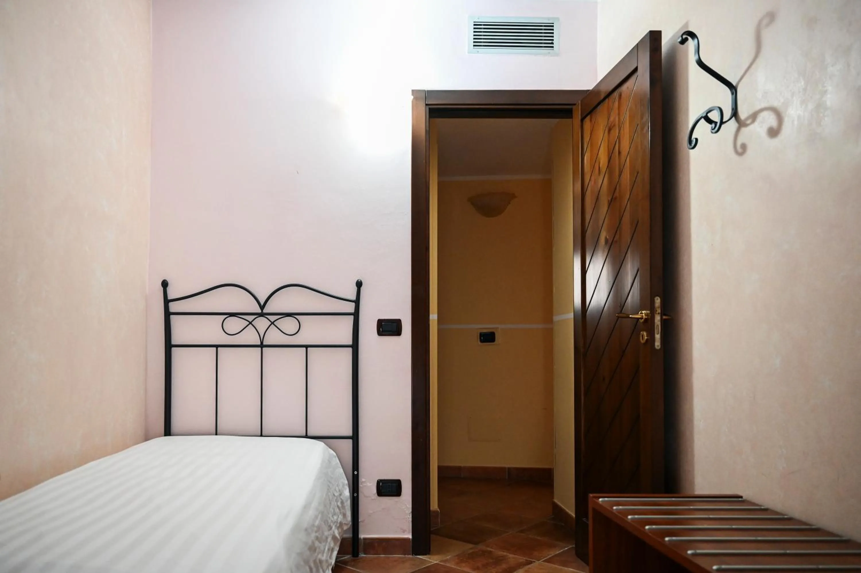 Bed in Hotel Palazzo Krataiis