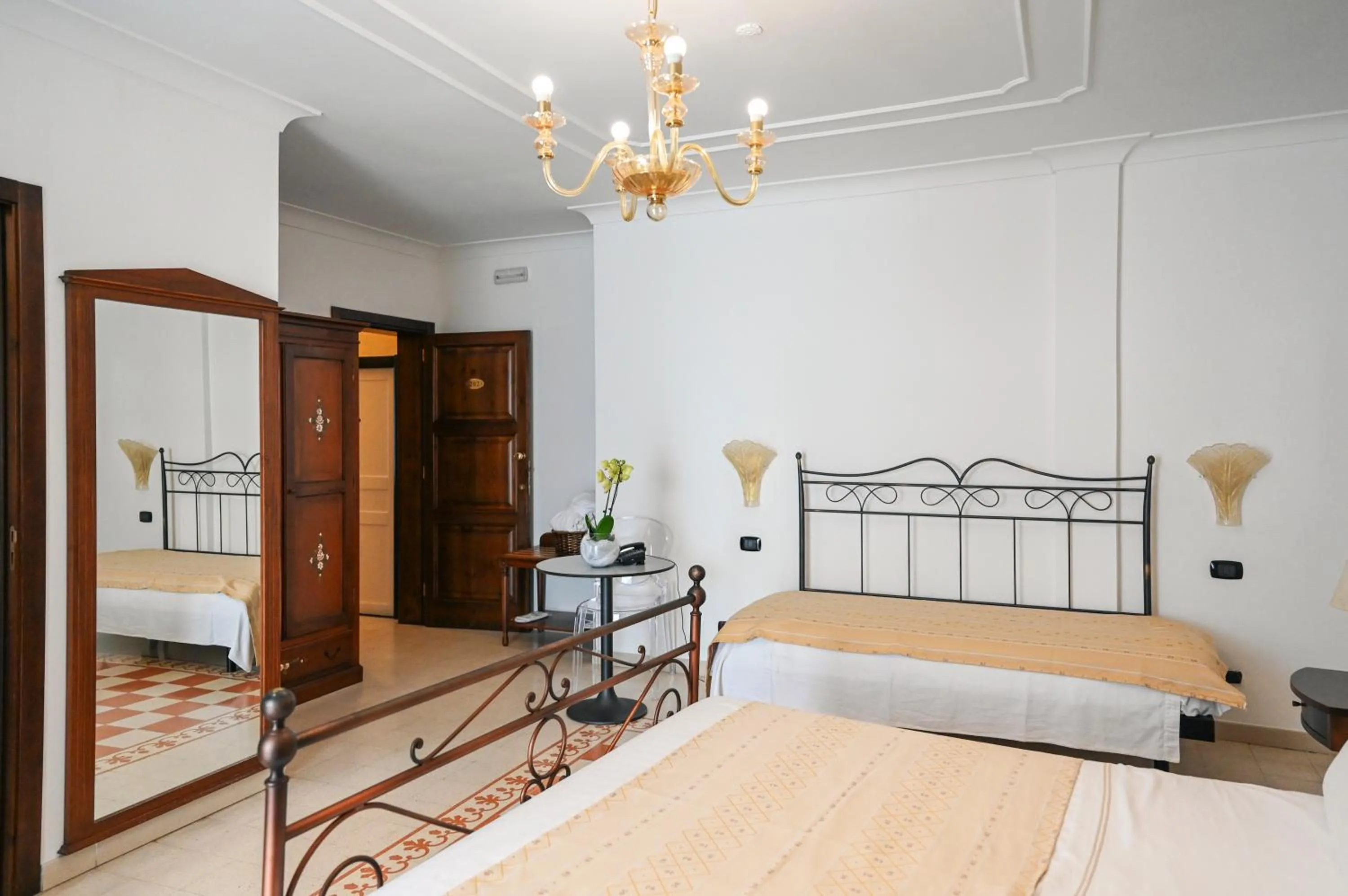 Bed in Hotel Palazzo Krataiis