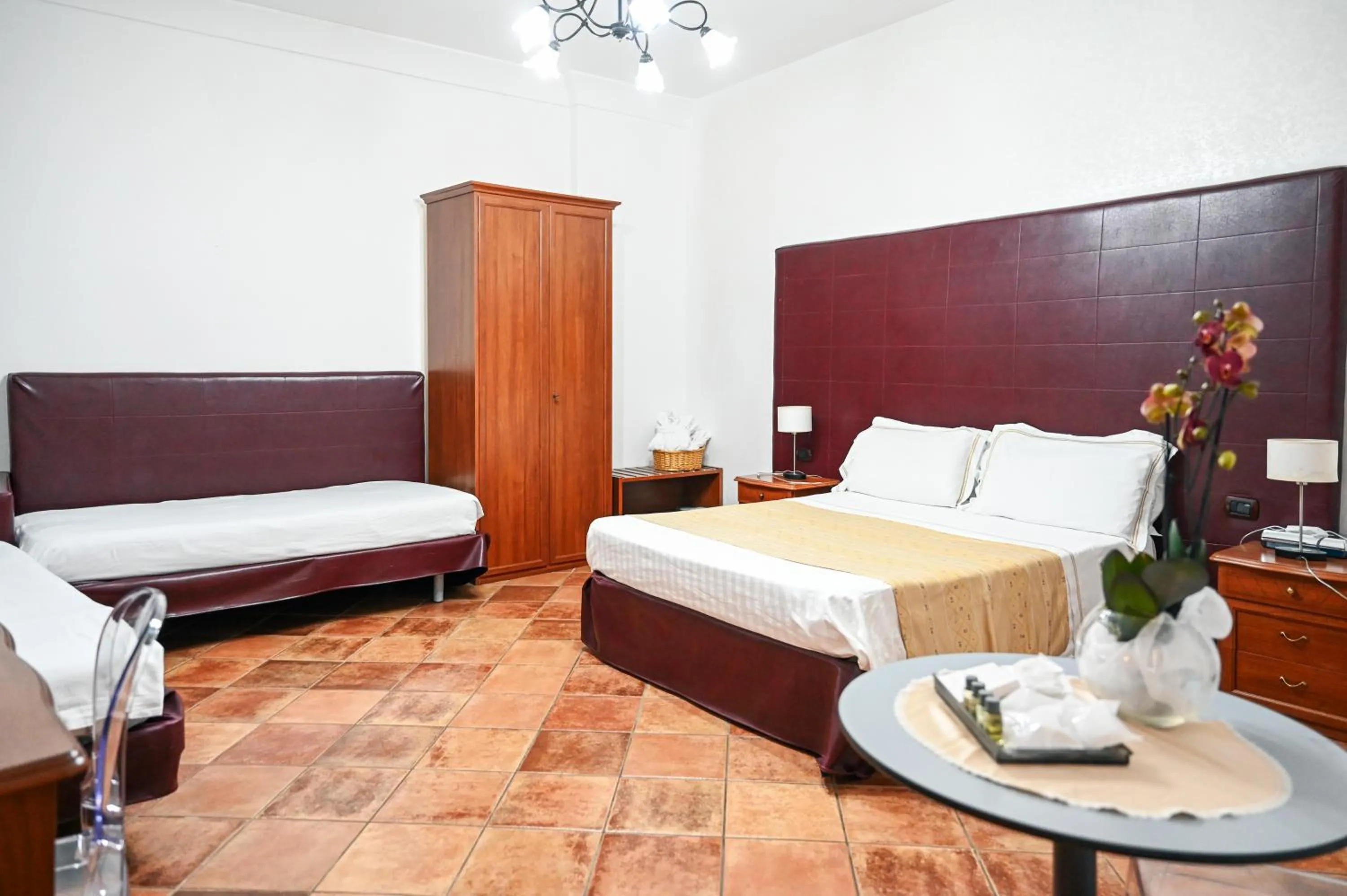 Bed in Hotel Palazzo Krataiis