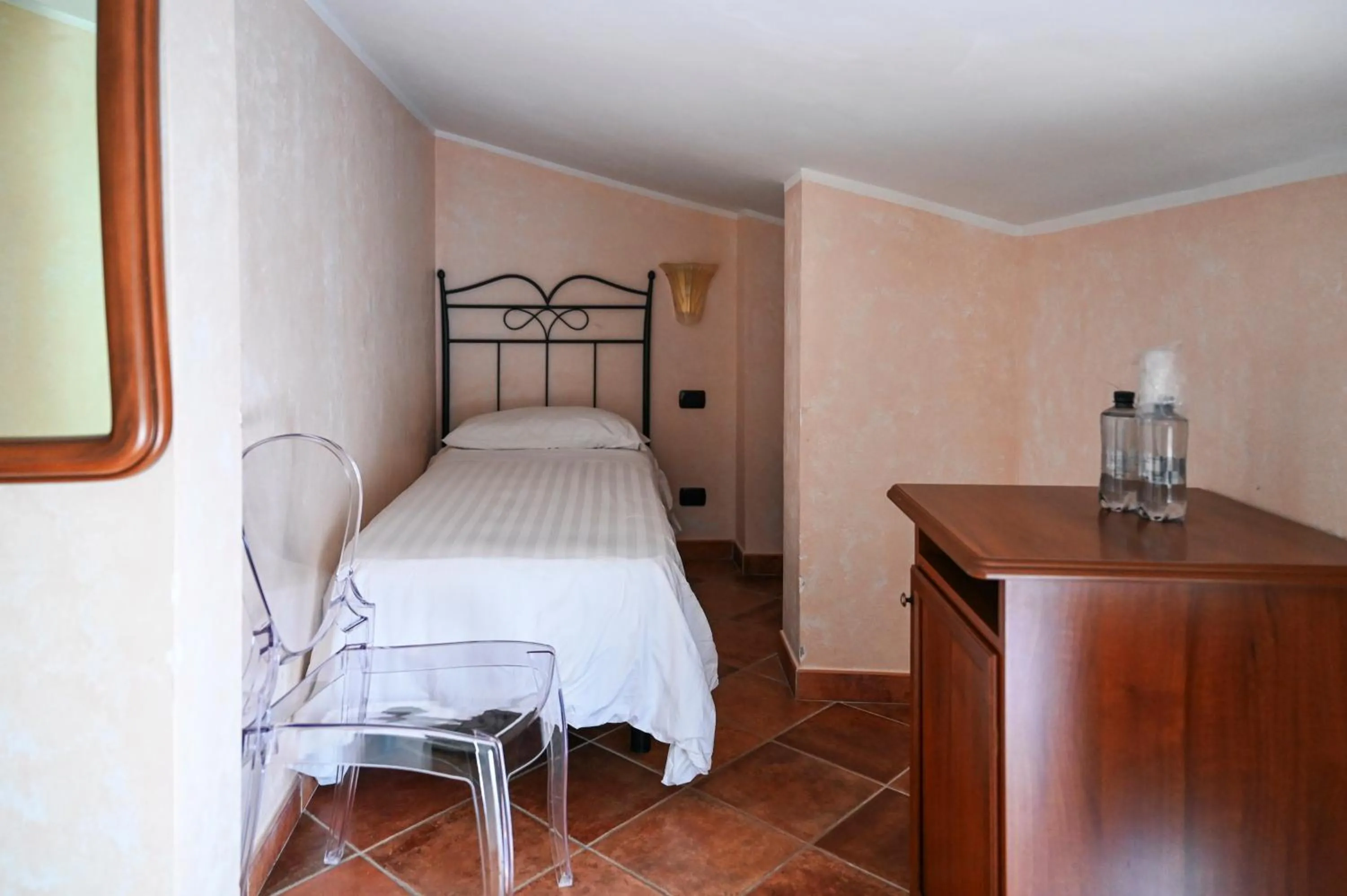 Bed in Hotel Palazzo Krataiis