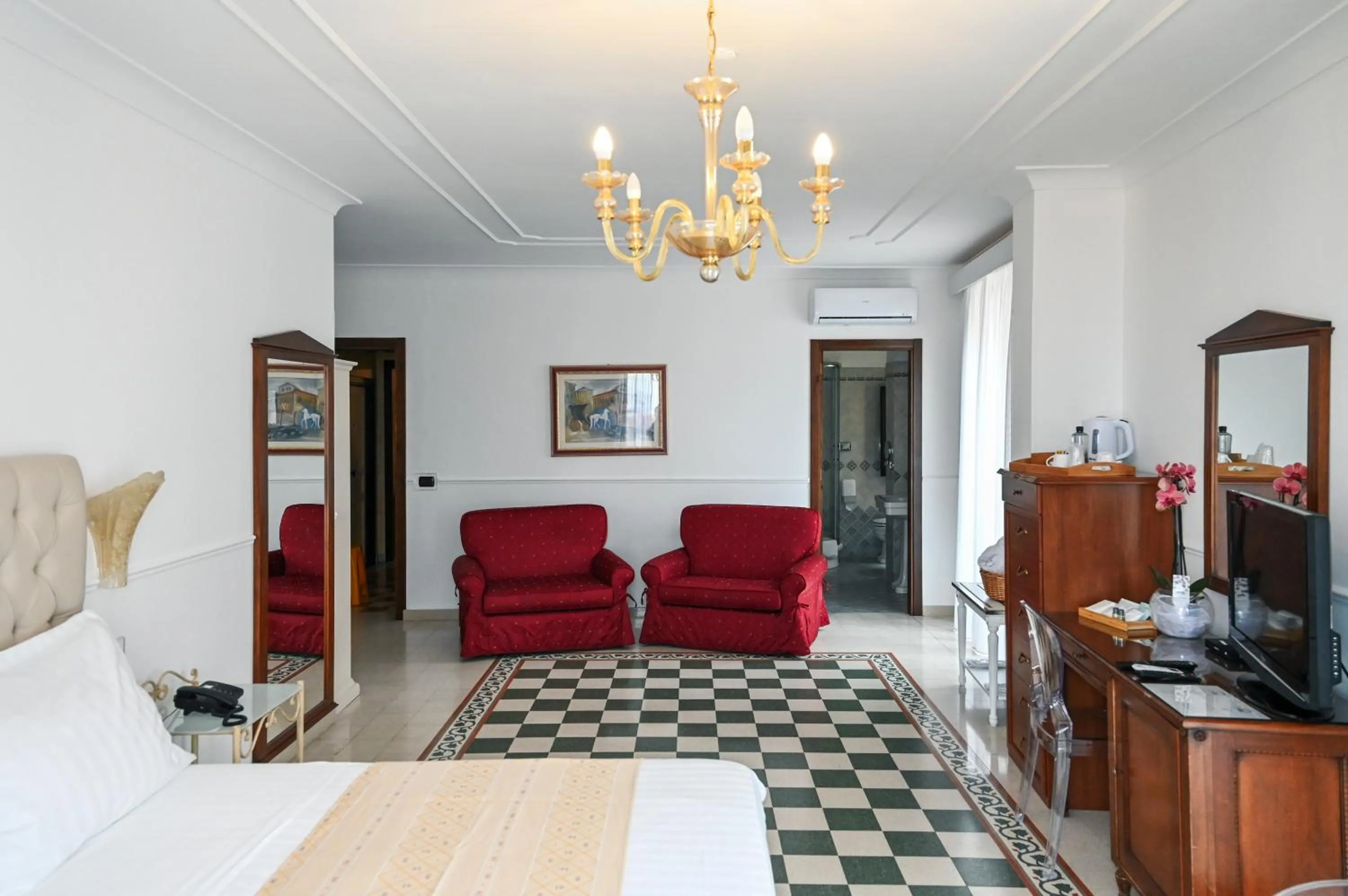 Bed in Hotel Palazzo Krataiis