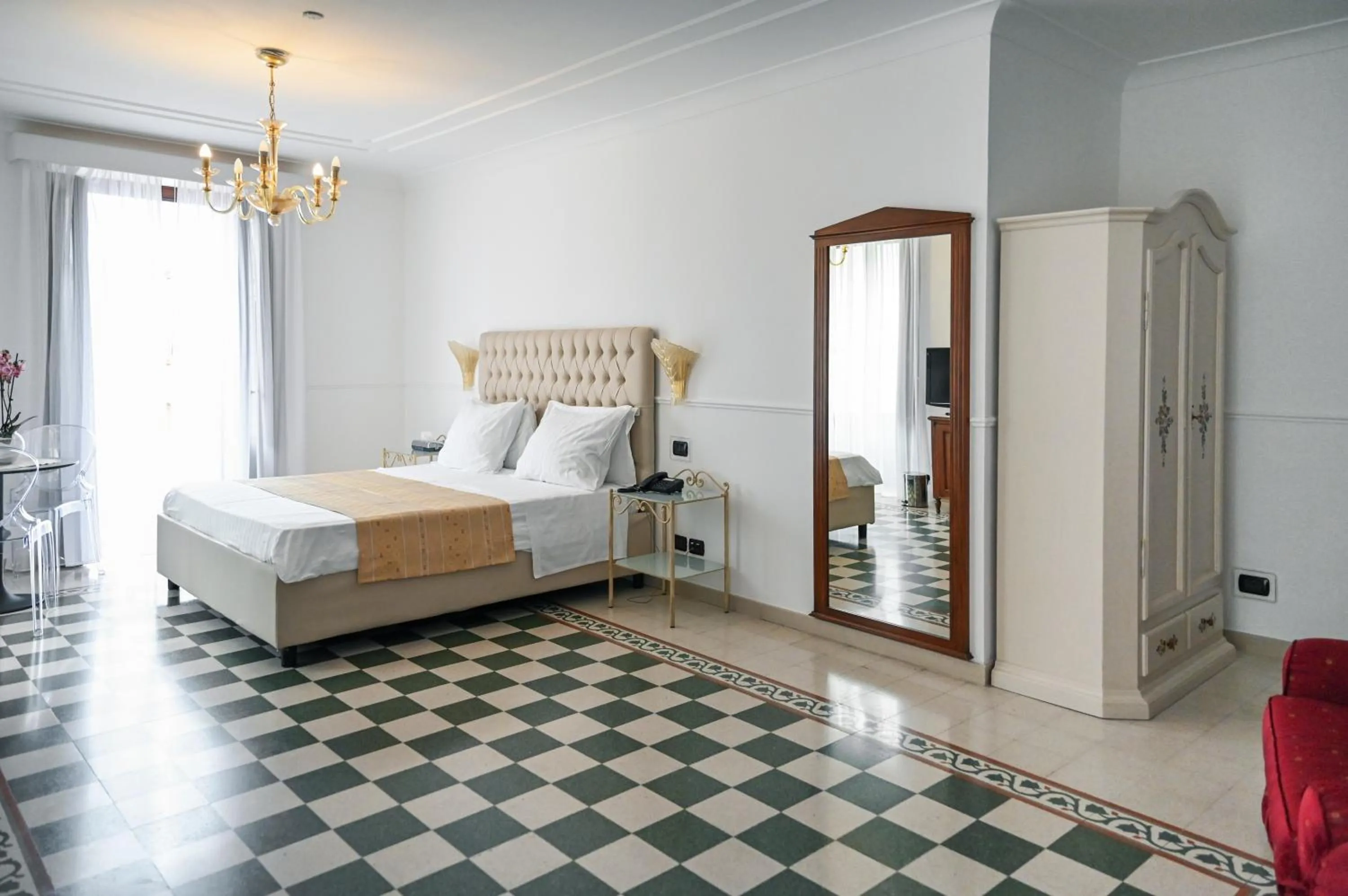 Bed in Hotel Palazzo Krataiis