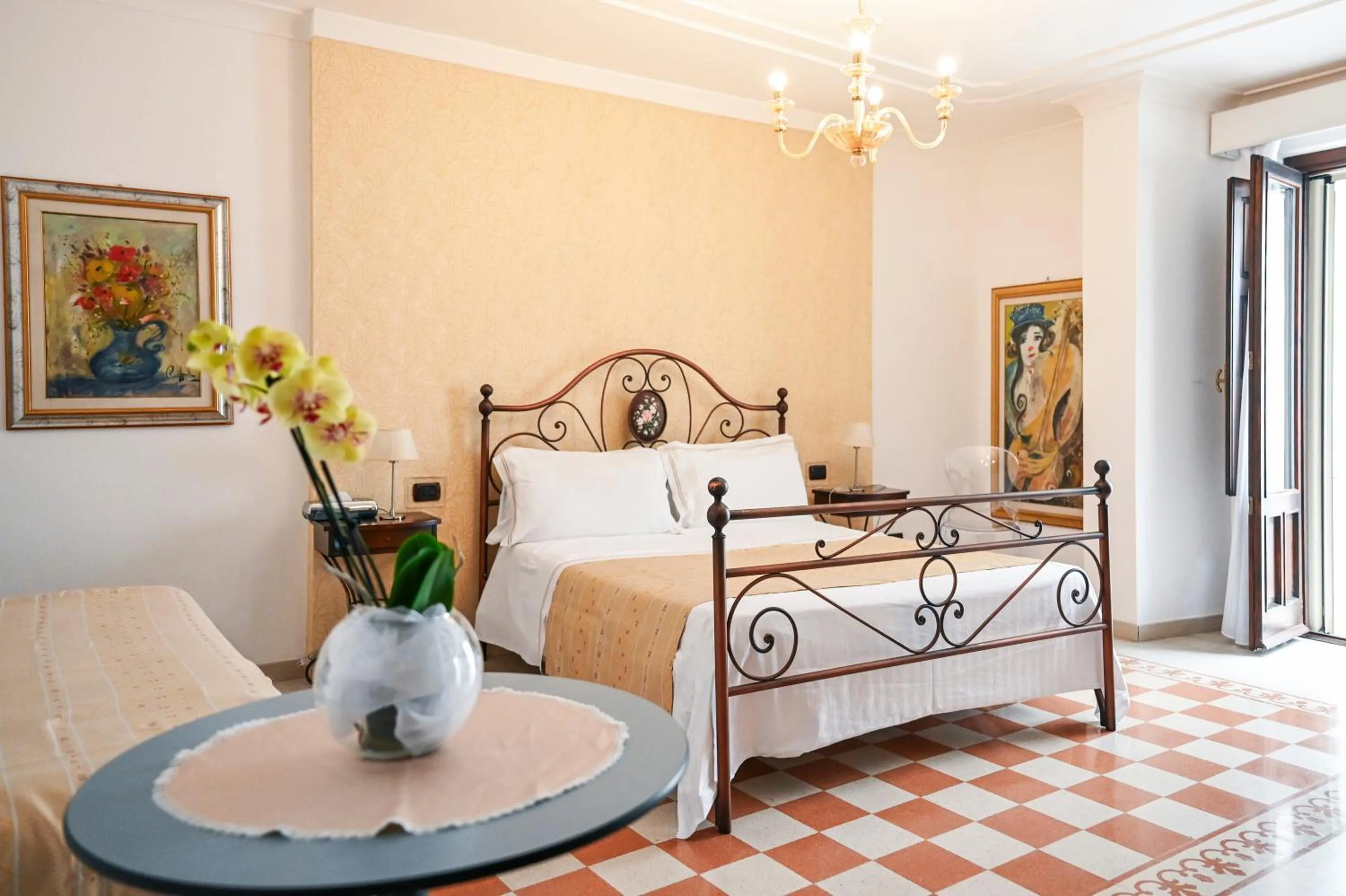 Bed in Hotel Palazzo Krataiis
