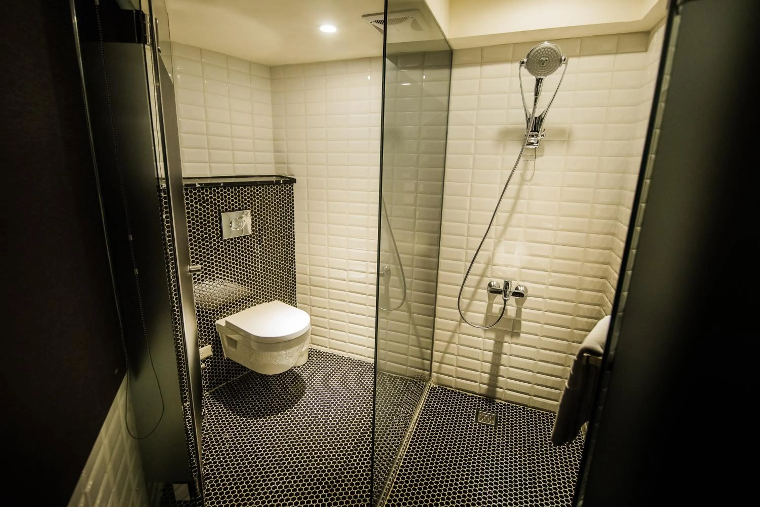 Shower in Huwei Hotel