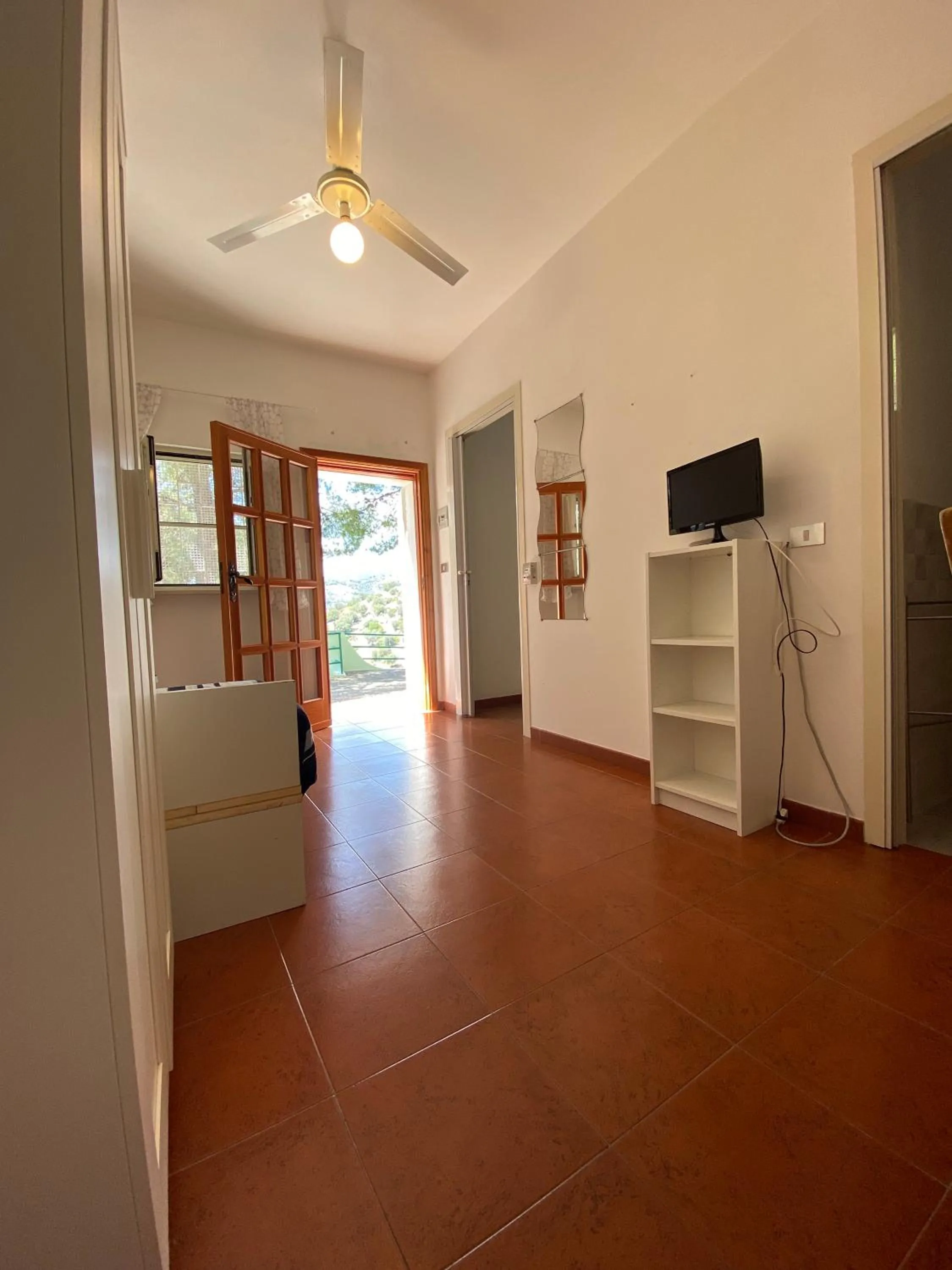 Communal lounge/ TV room in Villa Marhù