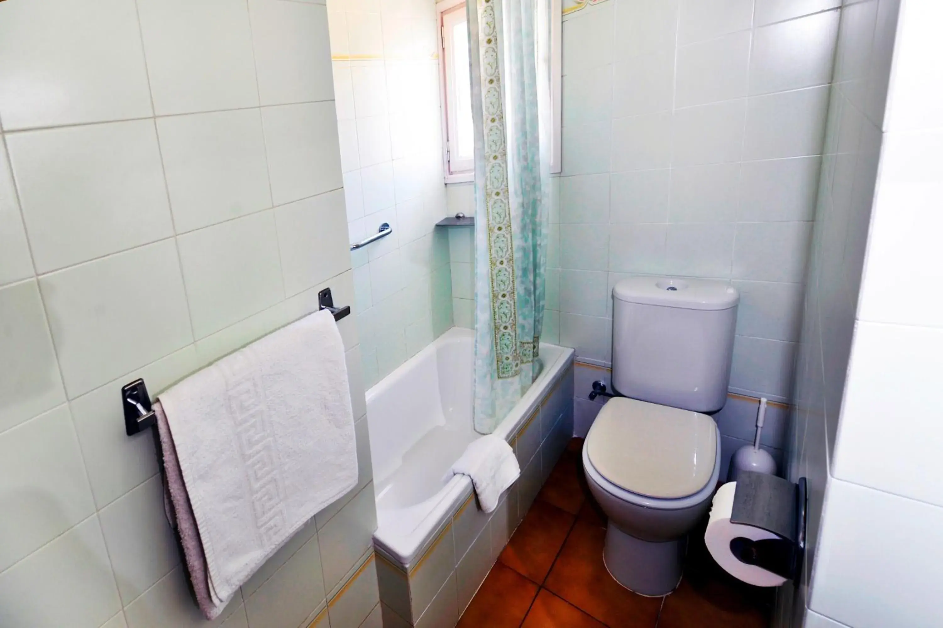 Triple Room in Hostal Magnolia Triple Room in Hostal Magnolia