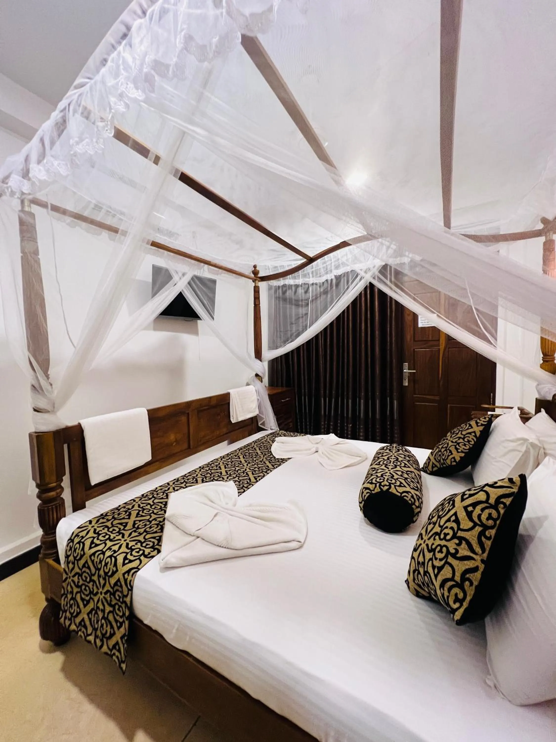 Bed in Top Secret Beach Hotel