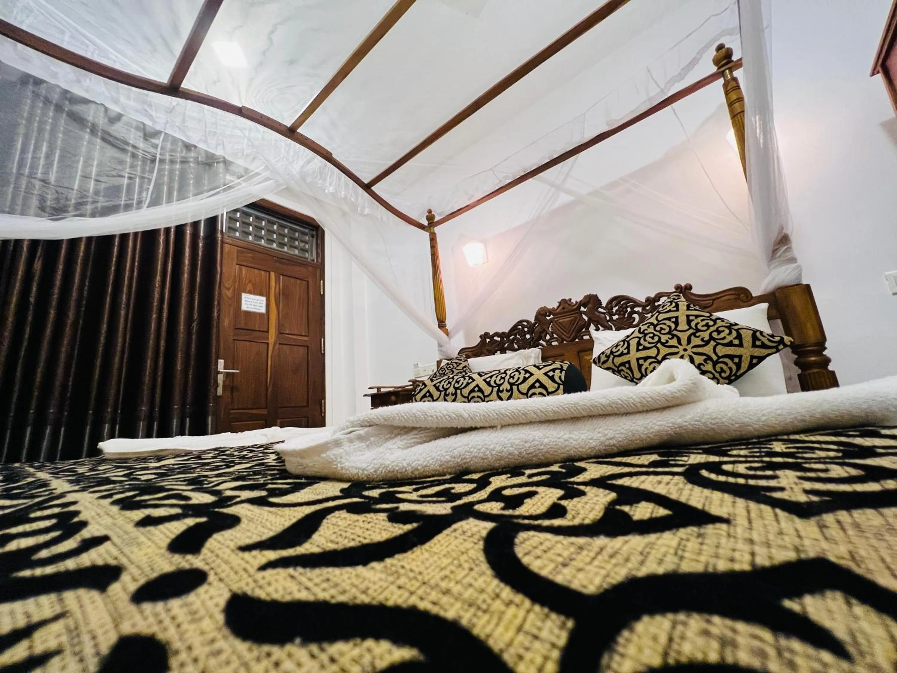 Bed in Top Secret Beach Hotel