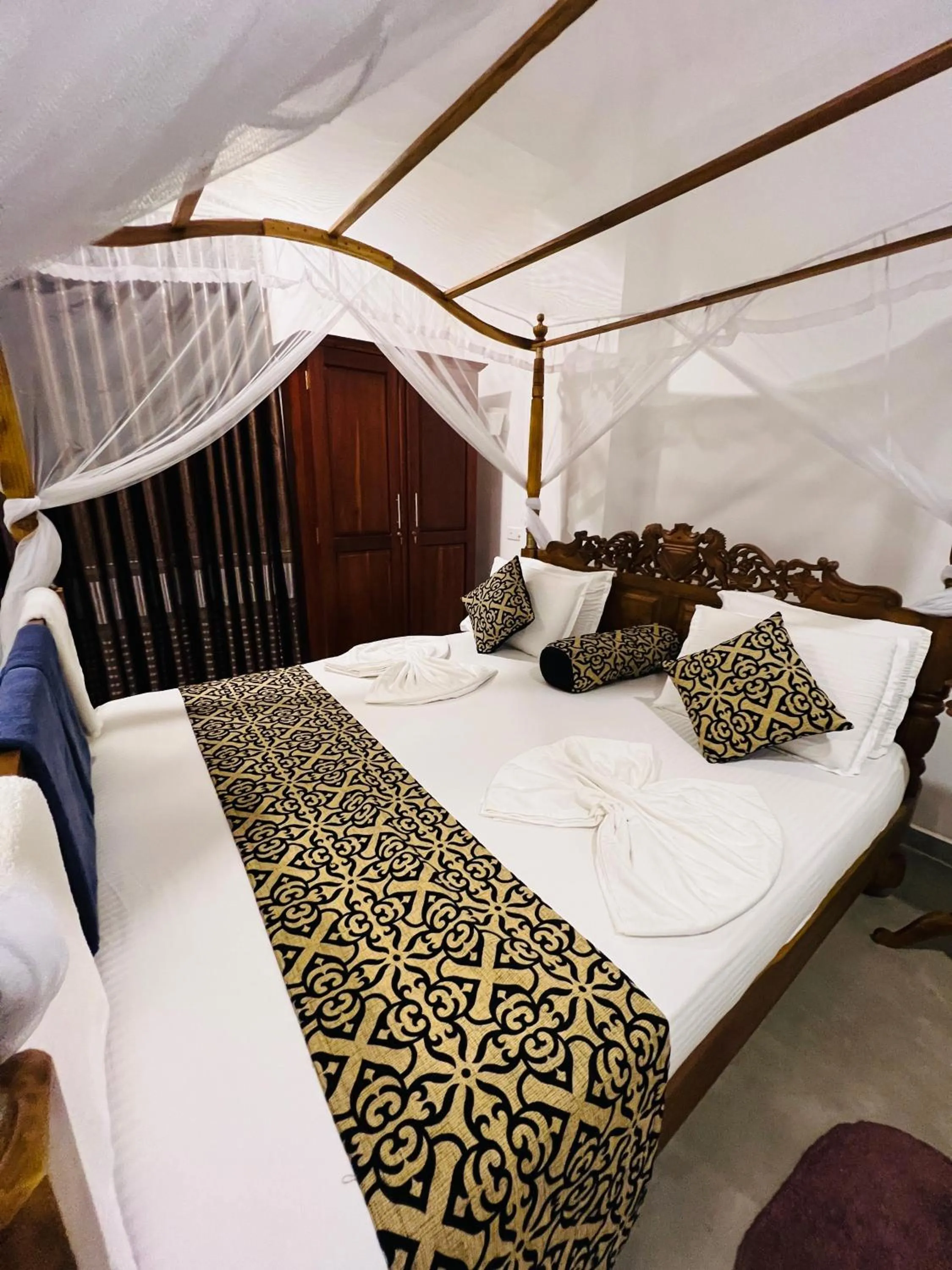 Bed in Top Secret Beach Hotel