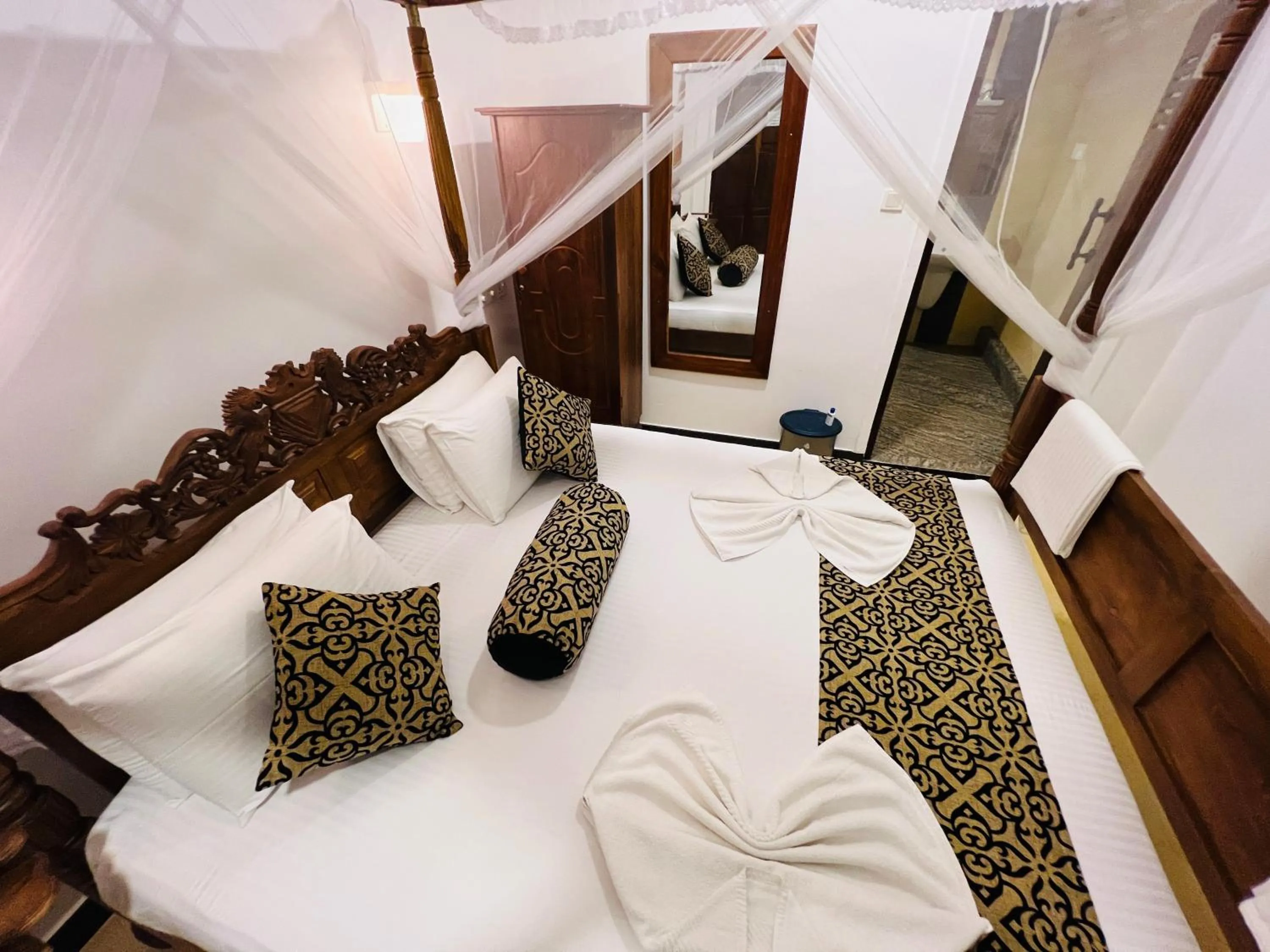 Bed in Top Secret Beach Hotel