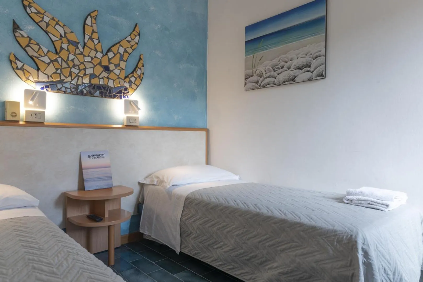 Bed in Hotel Giorgetti Orange