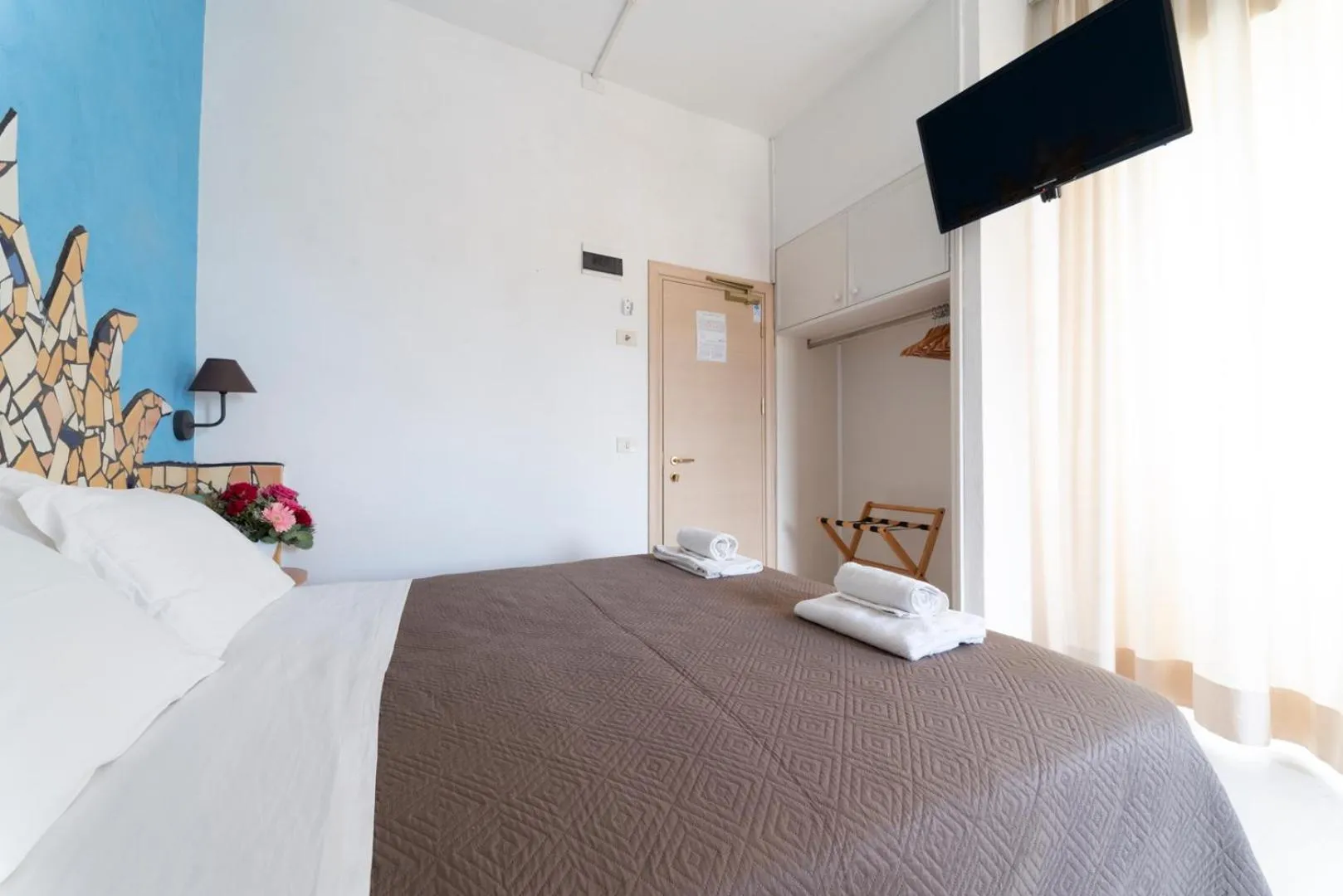 Bed in Hotel Giorgetti Orange