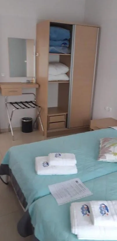 Bed in TETYK Keramoti Hotel Apartments