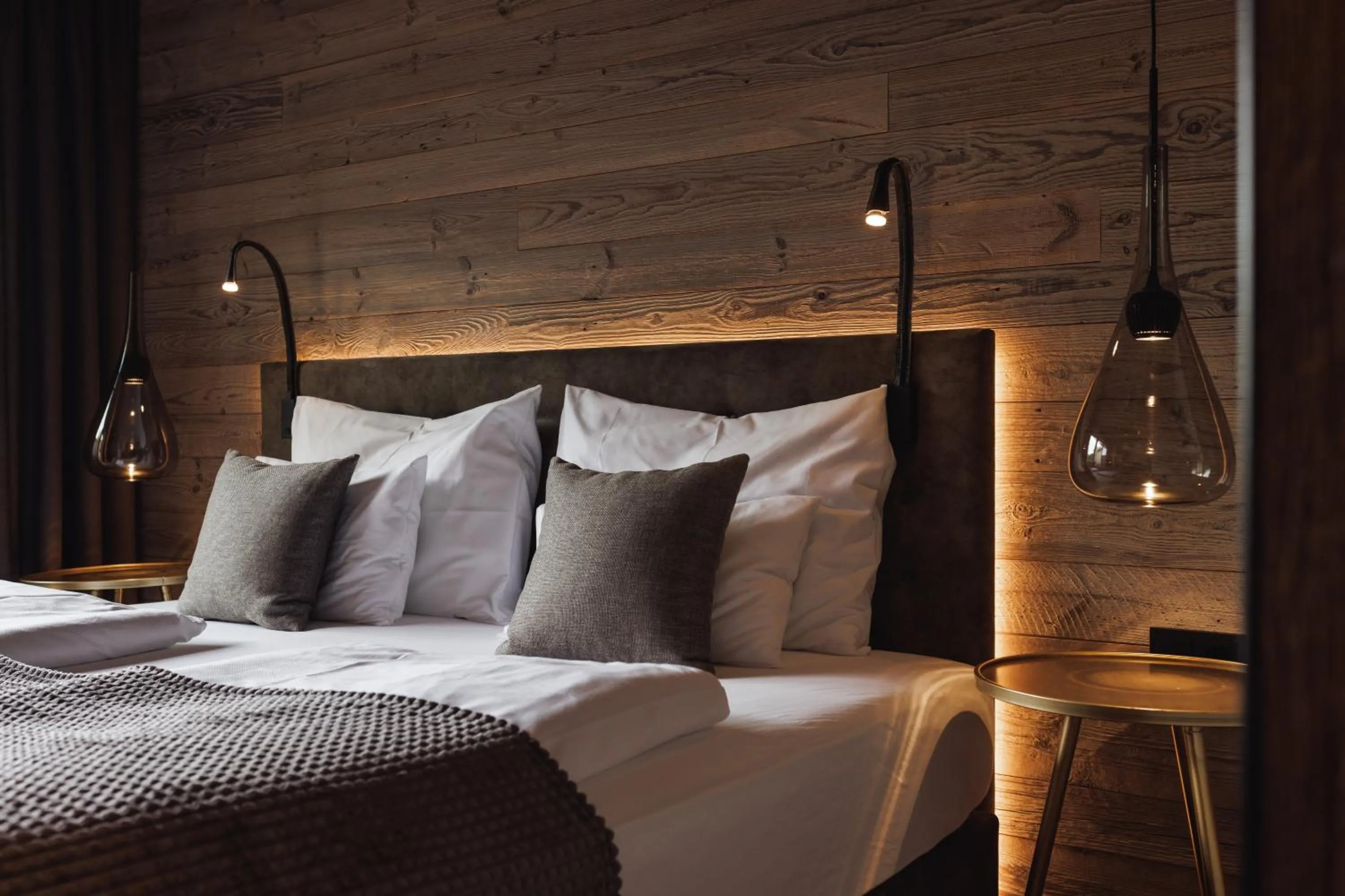 Bedroom, Bed in Alpenhotel Kitzbühel am Schwarzsee - 4 Sterne Superior