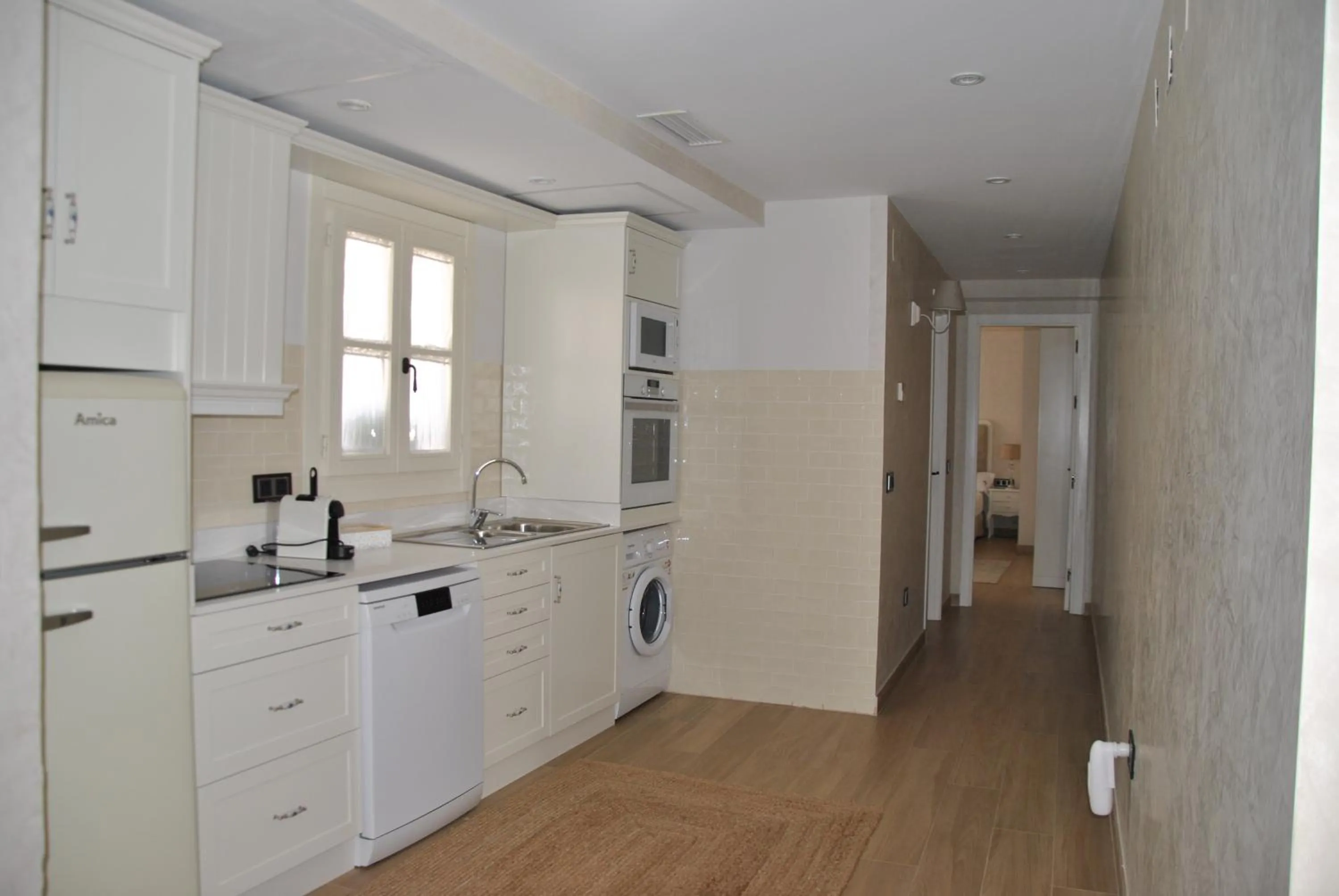 Kitchen or kitchenette in Suites La Posada De Pilar