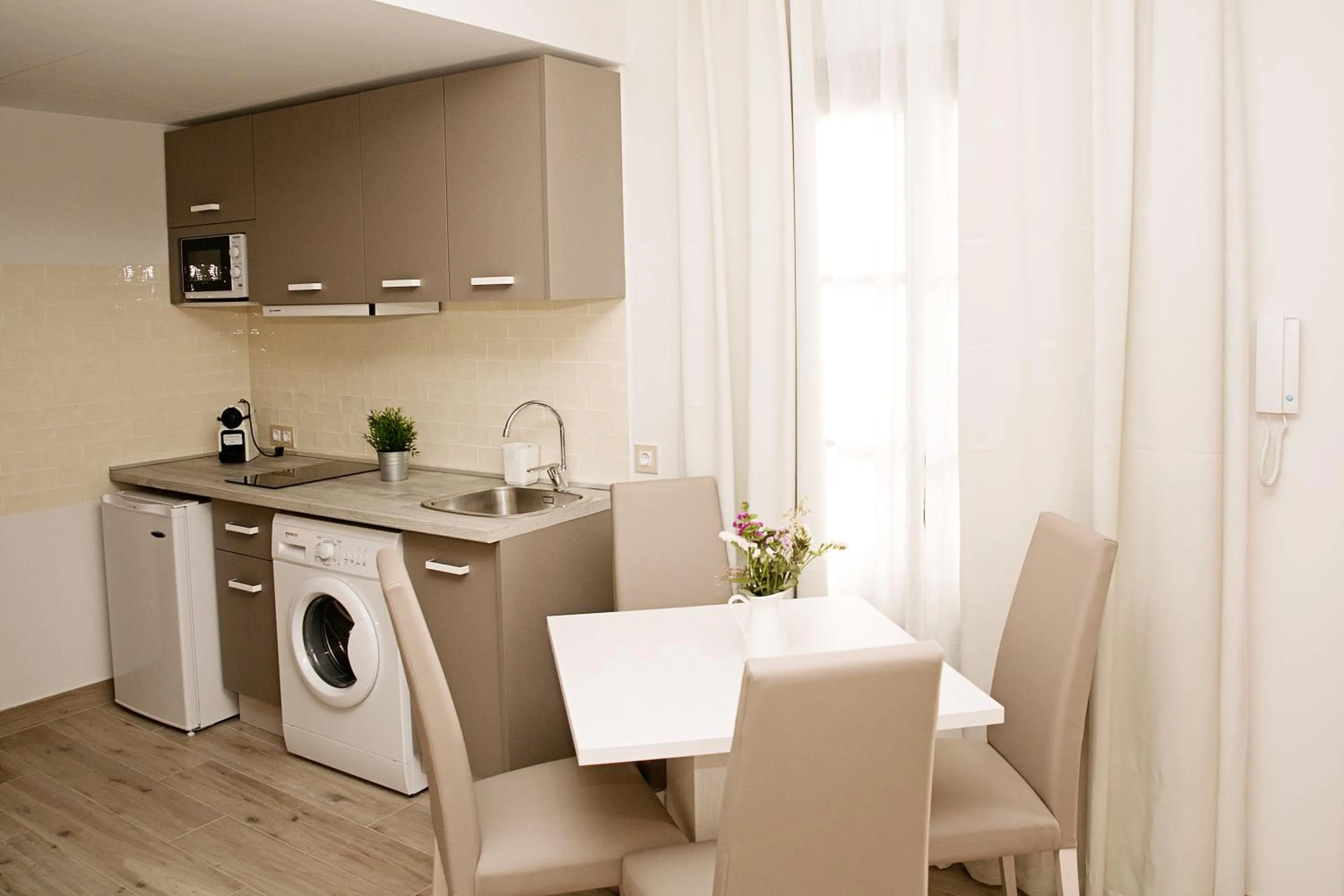 Kitchen or kitchenette in Suites La Posada De Pilar