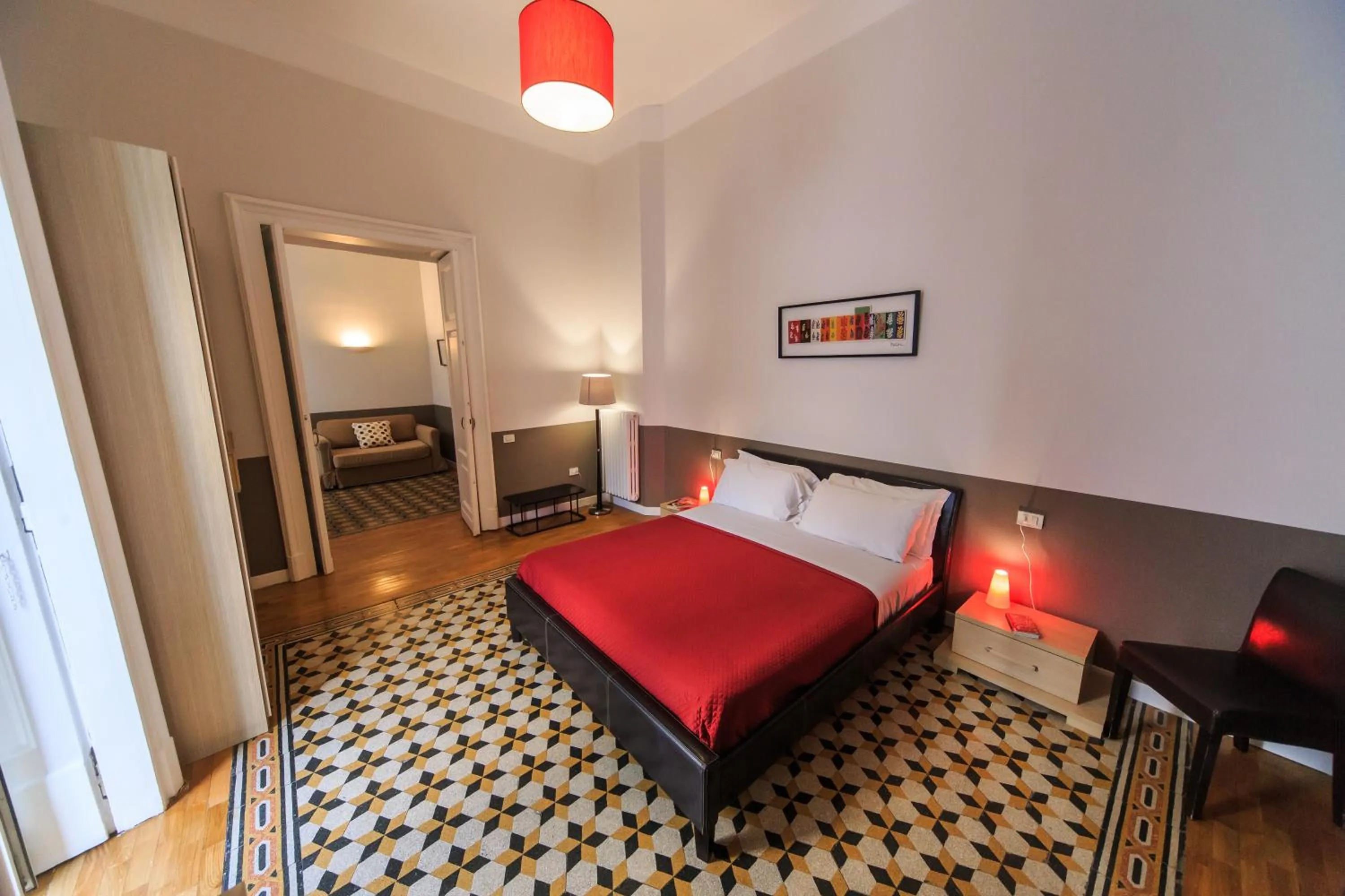 Living room, Bed in Spaccanapoli Comfort Suites