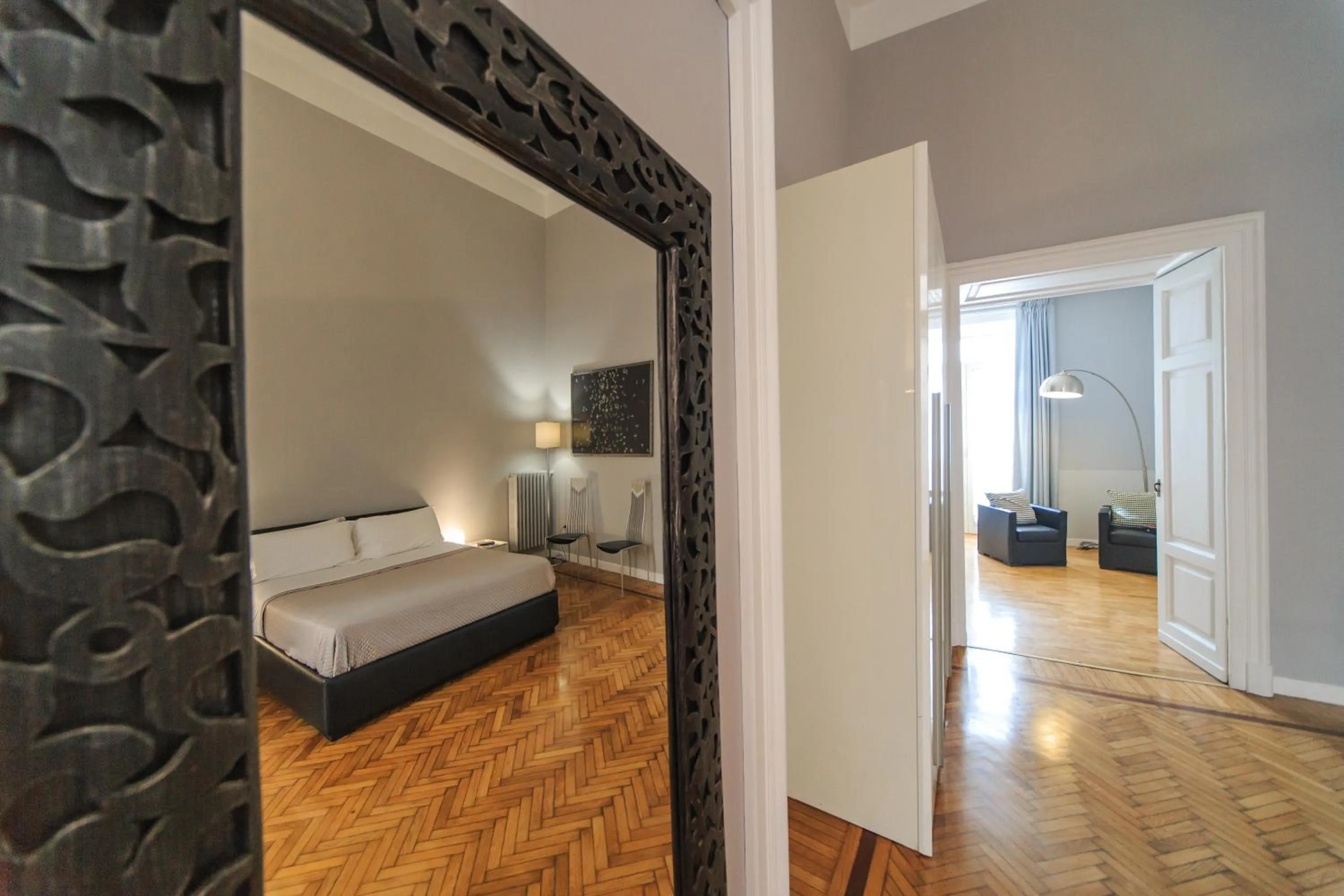 Living room, Bed in Spaccanapoli Comfort Suites