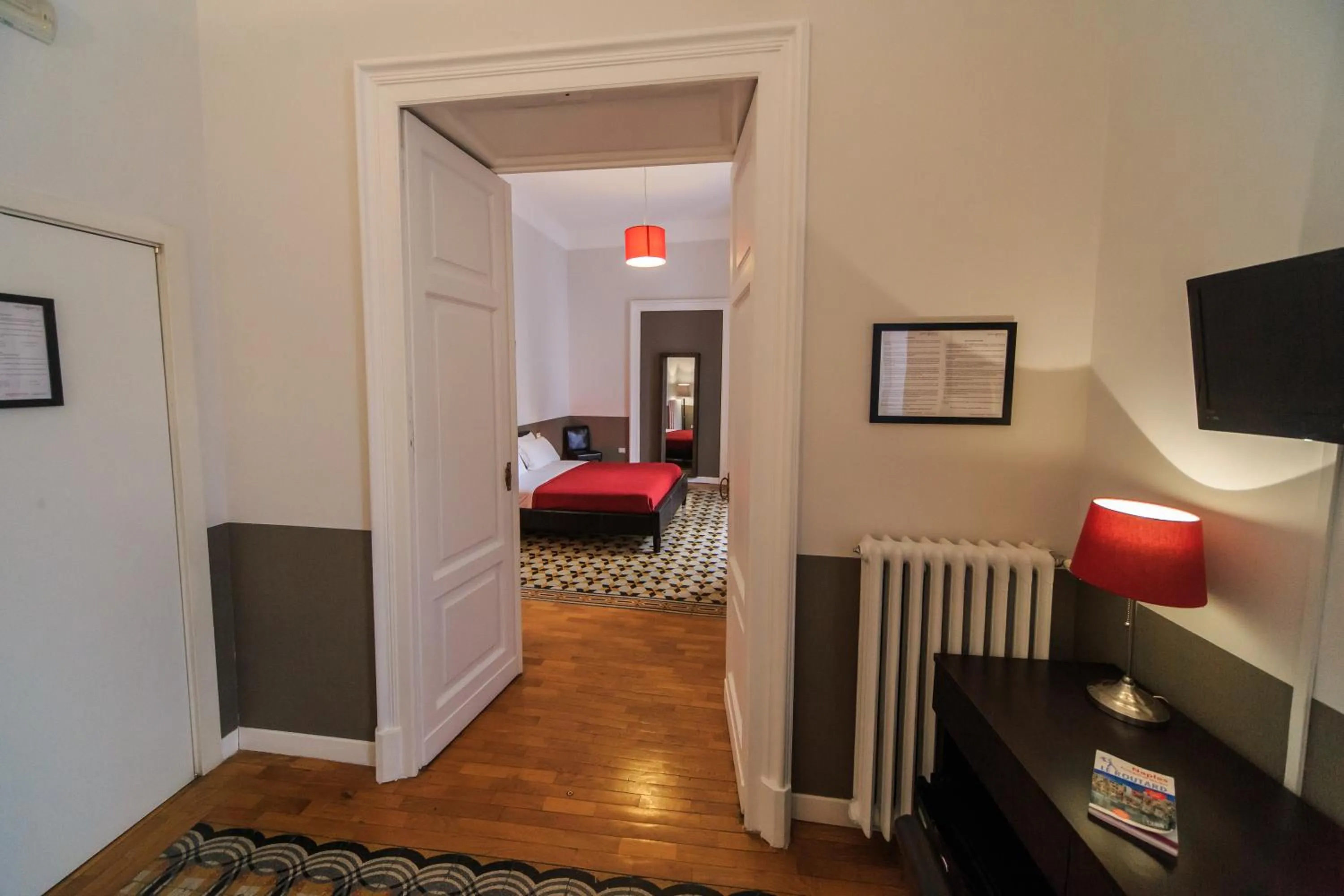 Living room, Bed in Spaccanapoli Comfort Suites