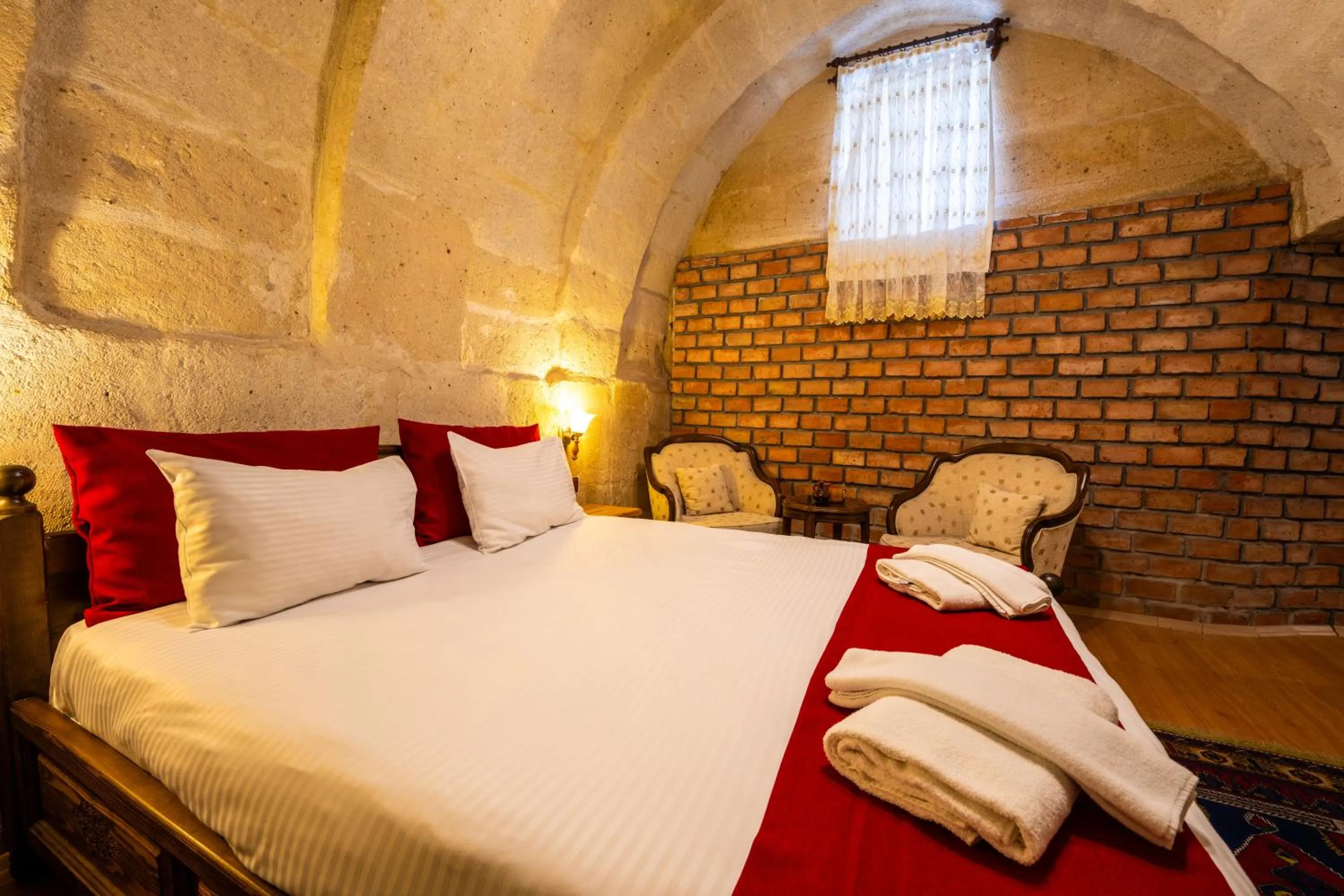 Bed in Asyada Suites Hotel