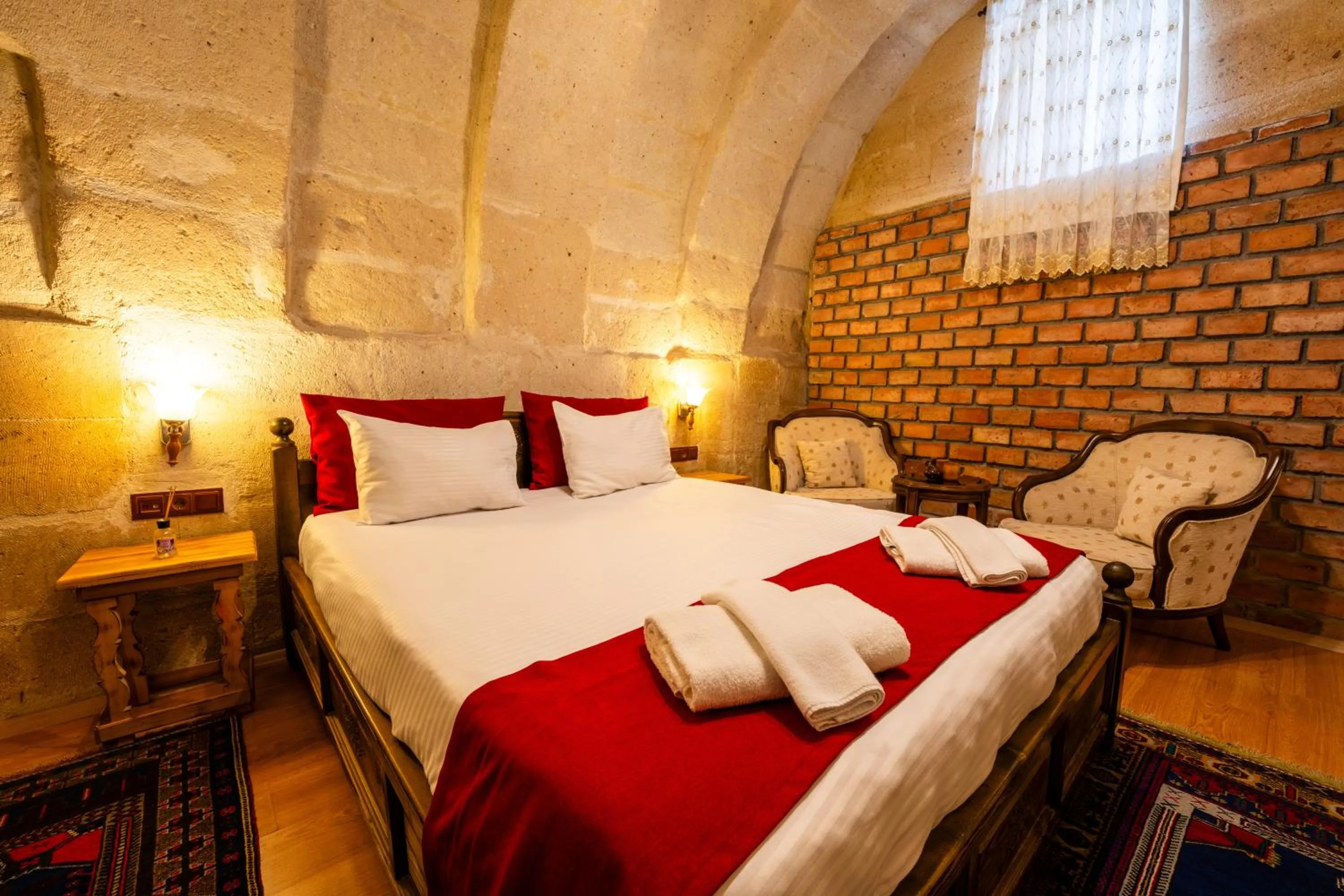 Bed in Asyada Suites Hotel