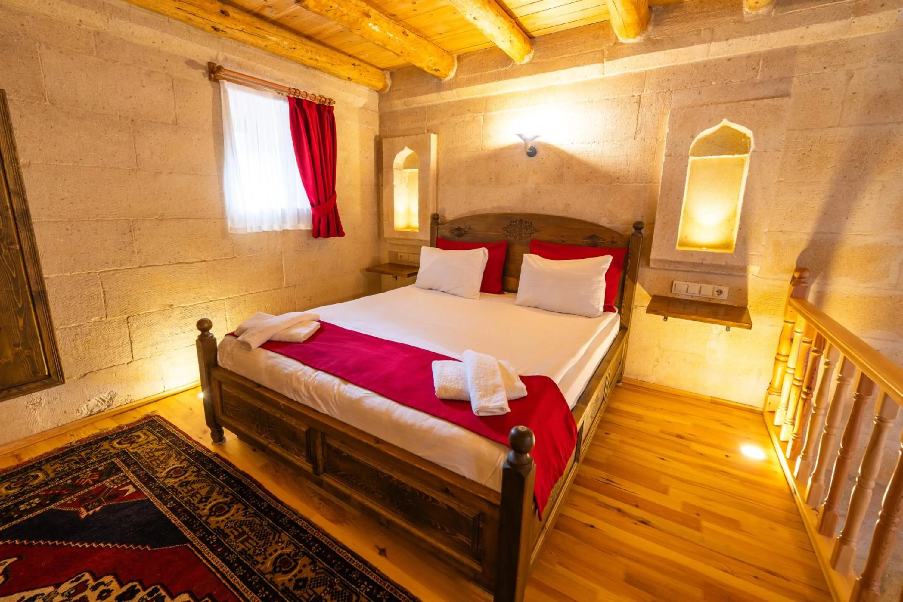 Bed in Asyada Suites Hotel