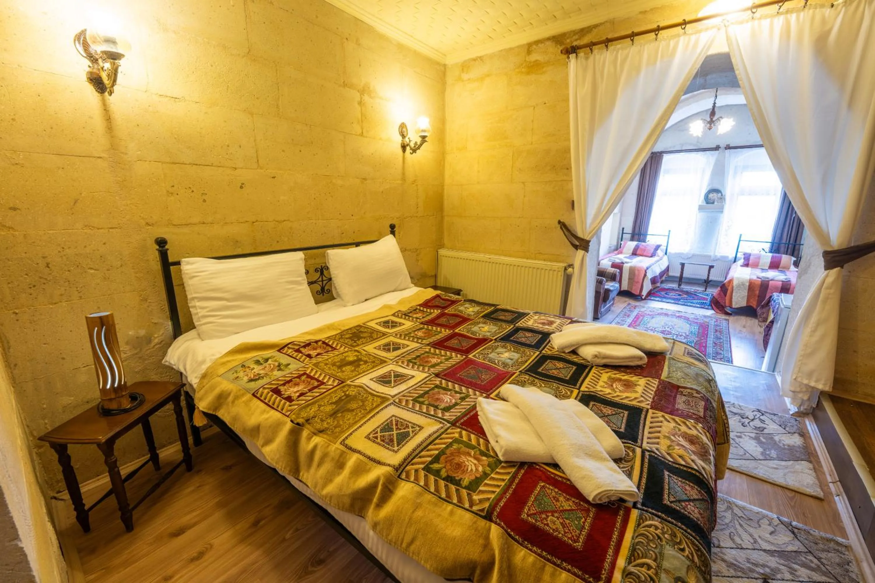 Photo of the whole room, Bed in Asyada Suites Hotel