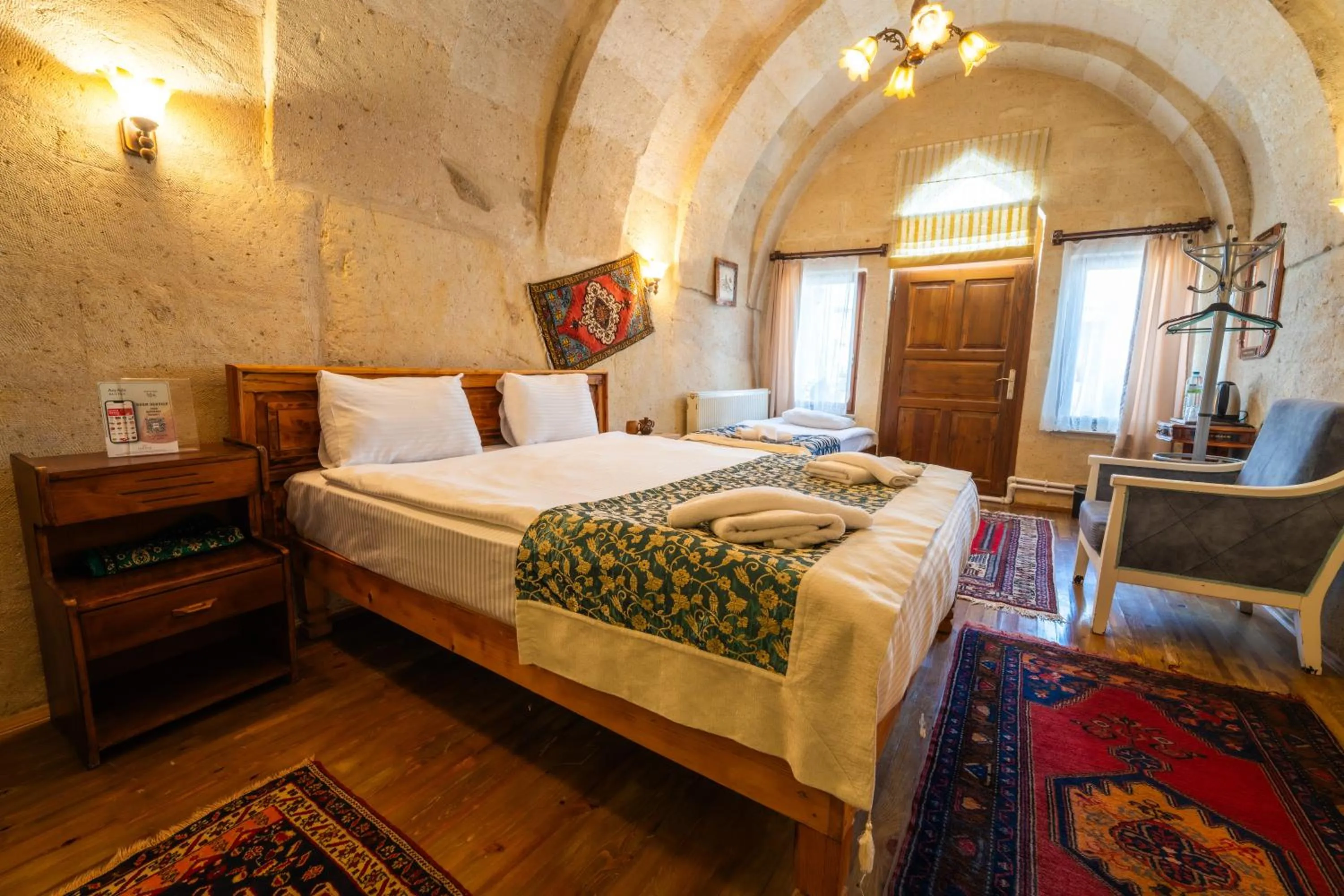 Photo of the whole room, Bed in Asyada Suites Hotel