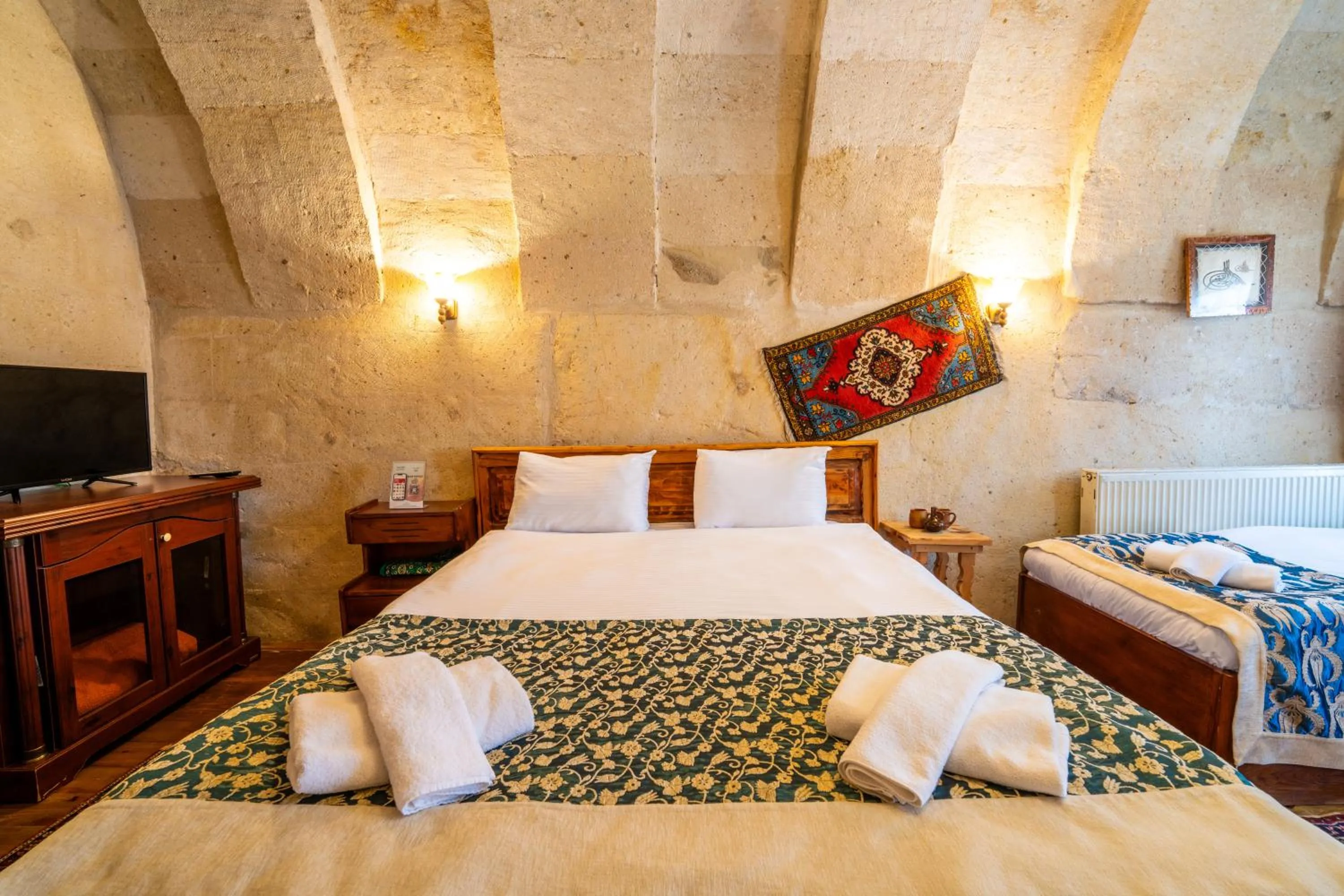 Bed in Asyada Suites Hotel