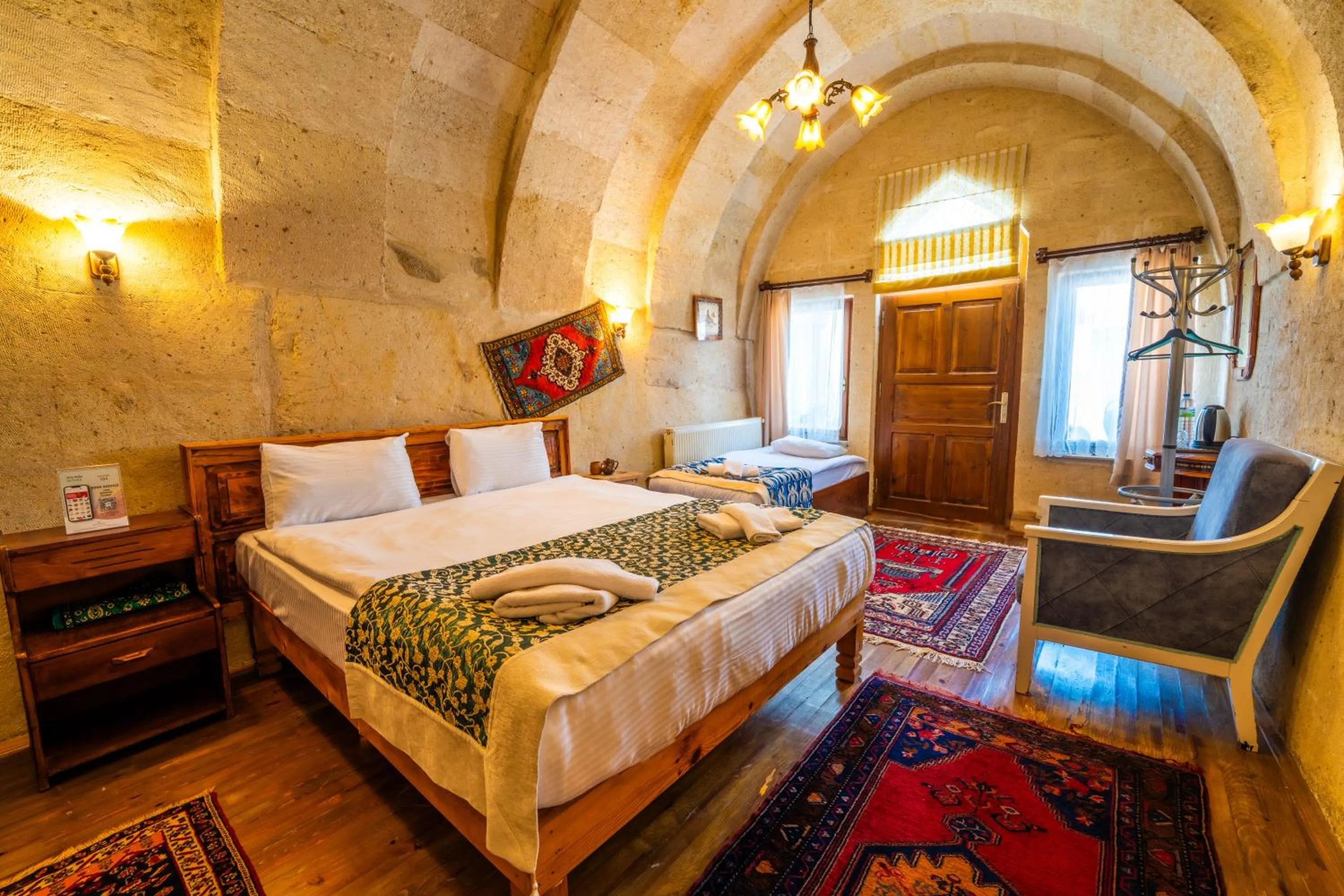 Photo of the whole room, Bed in Asyada Suites Hotel