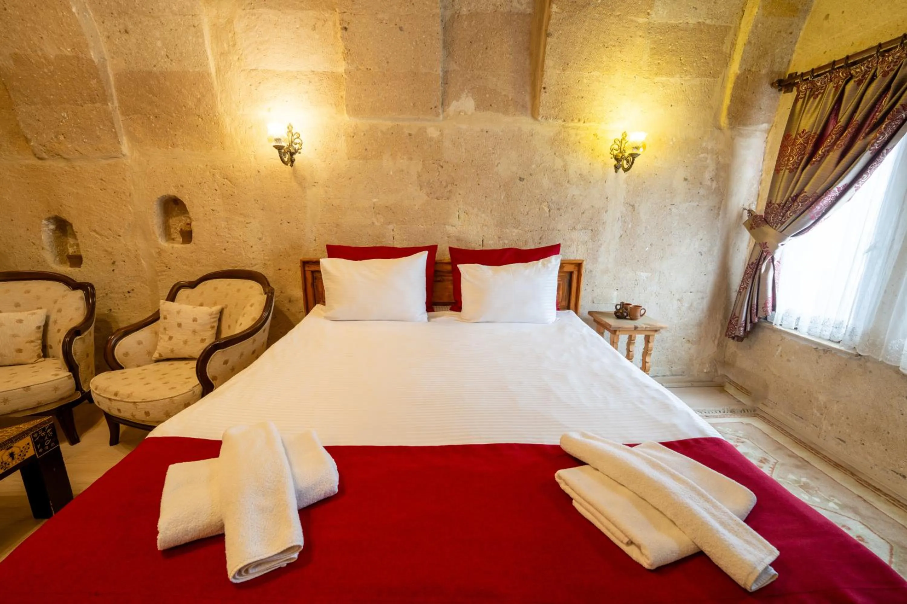 Bed in Asyada Suites Hotel