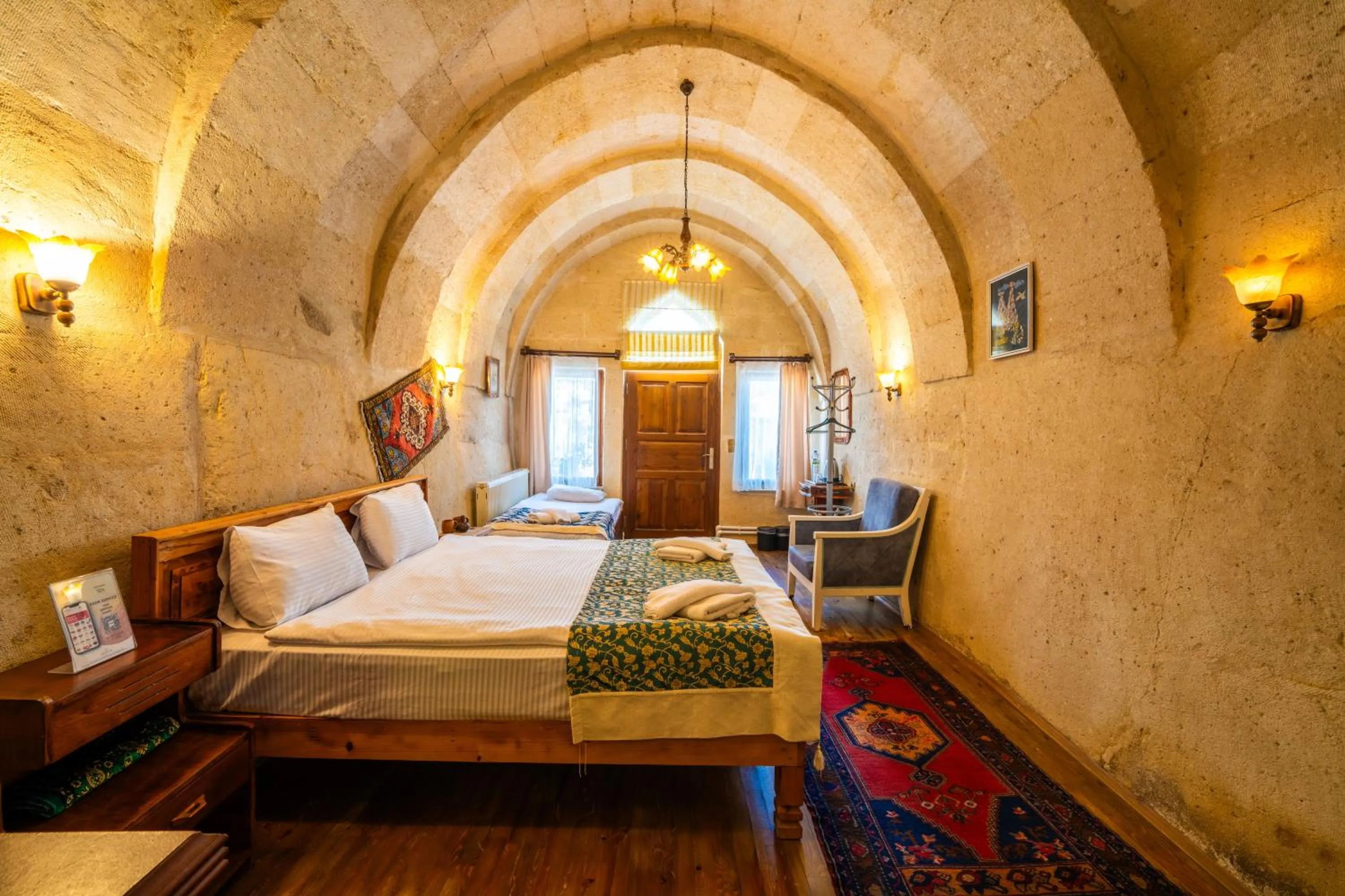 Photo of the whole room, Bed in Asyada Suites Hotel