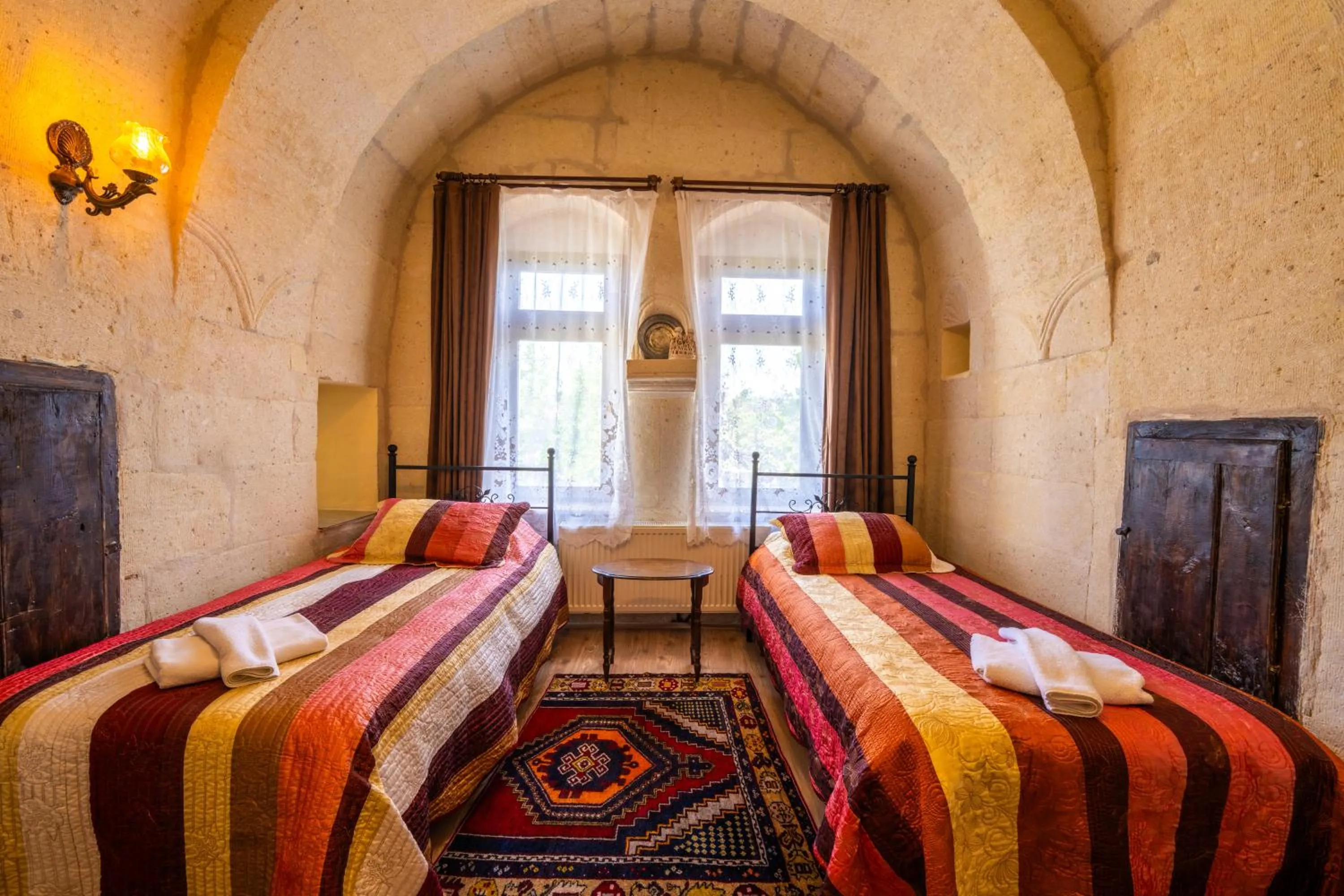 Bed in Asyada Suites Hotel