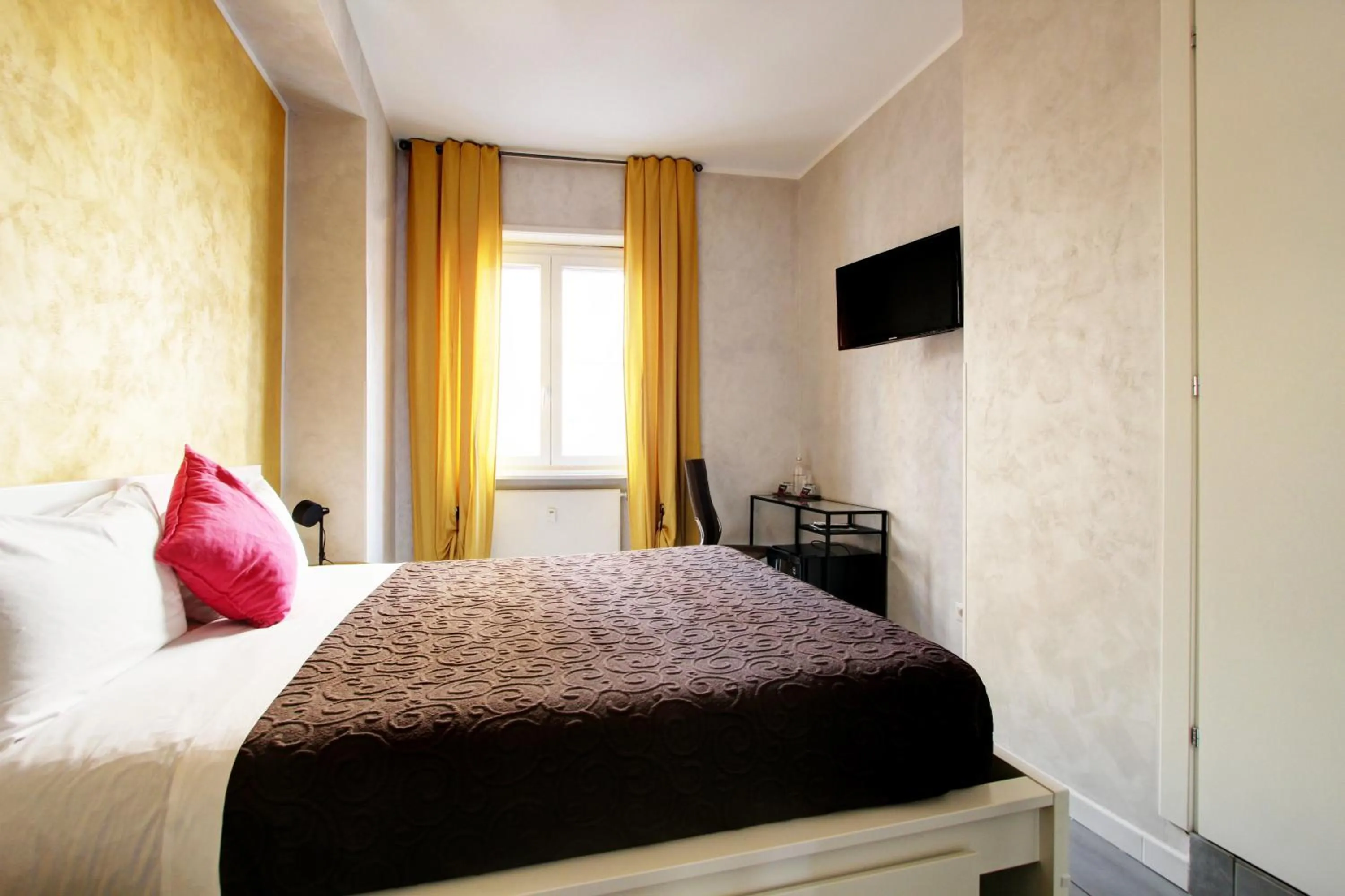 Bed in Vatican Central Suites