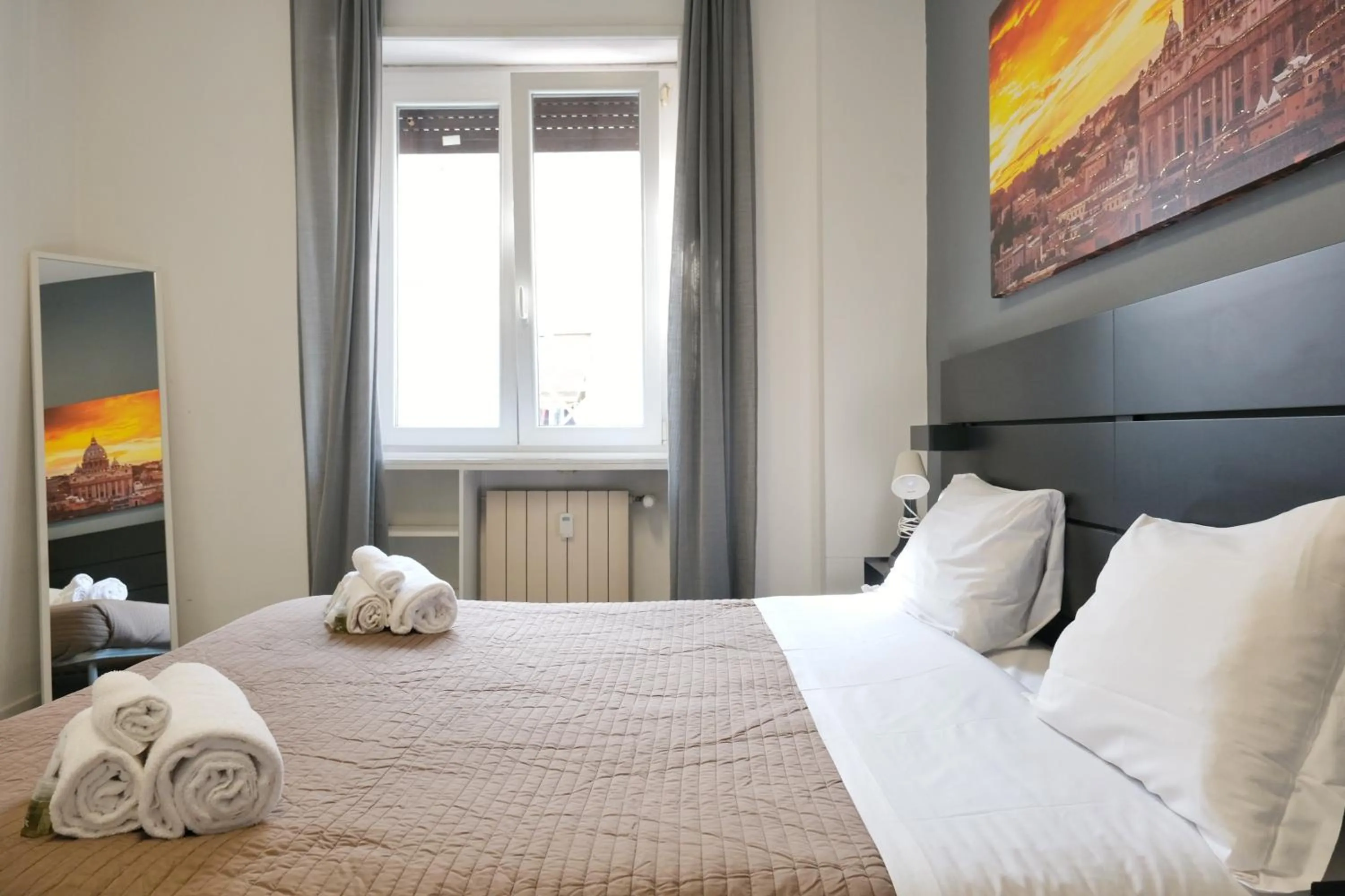 Bed in Vatican Central Suites