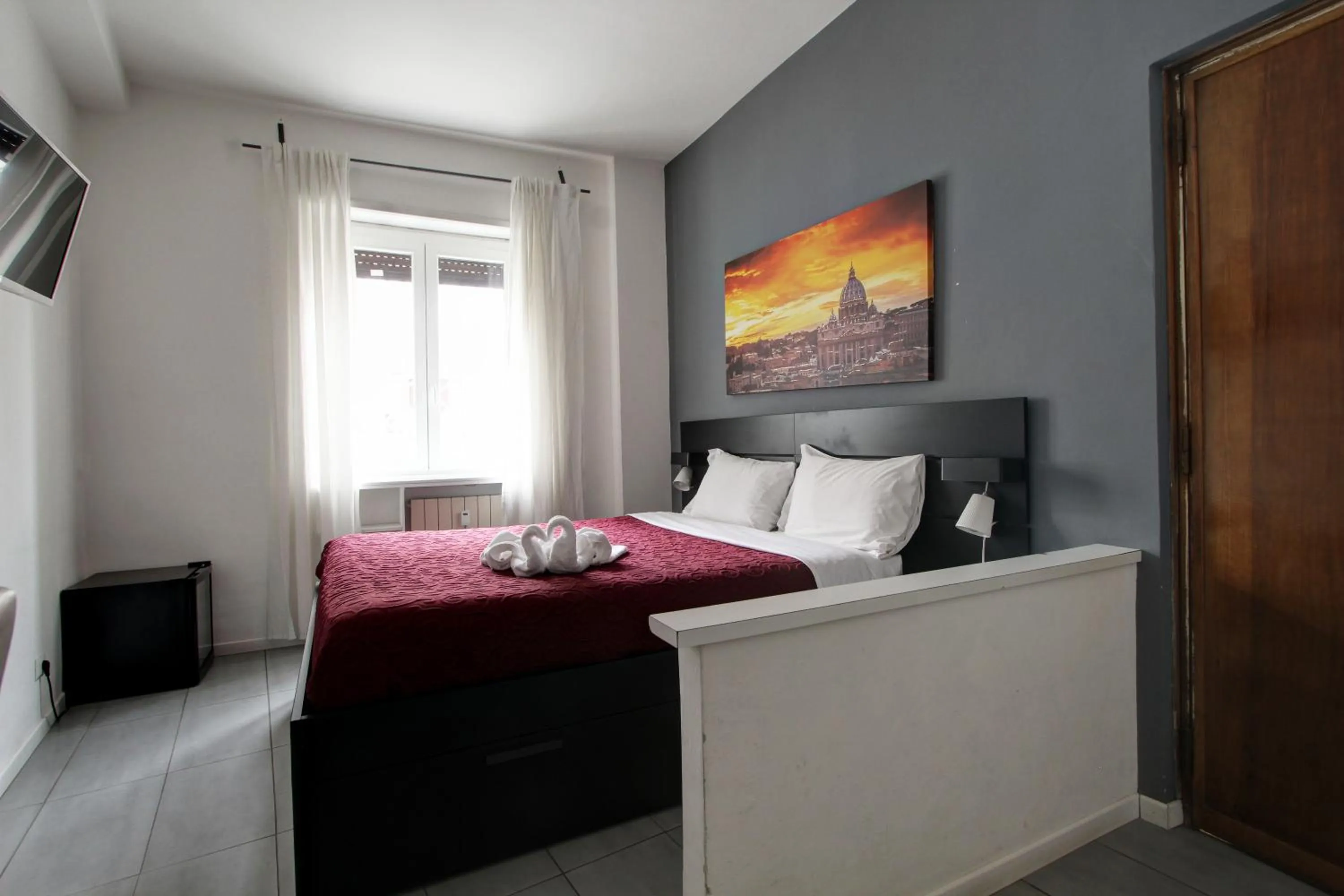 Bed in Vatican Central Suites