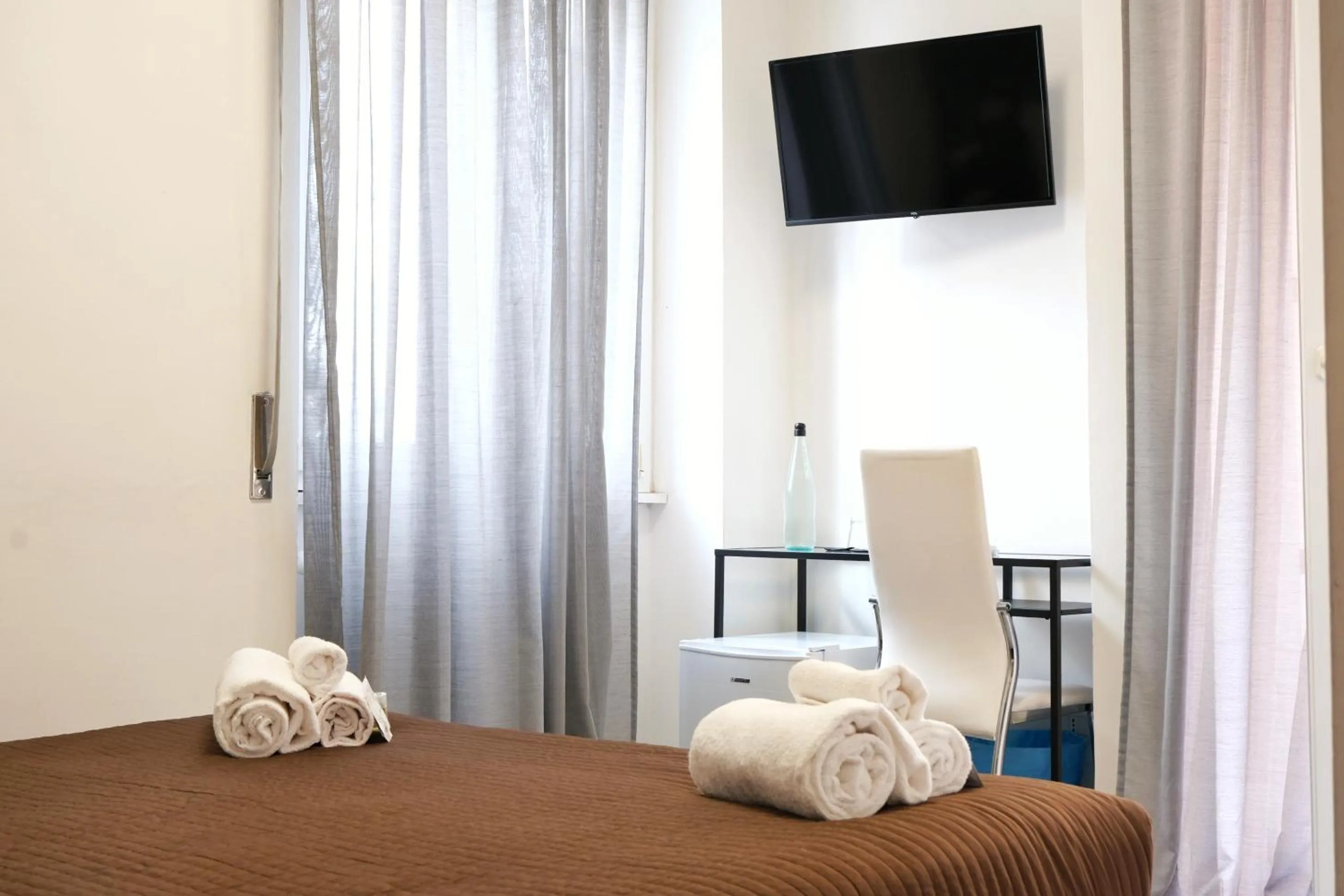 Bed in Vatican Central Suites