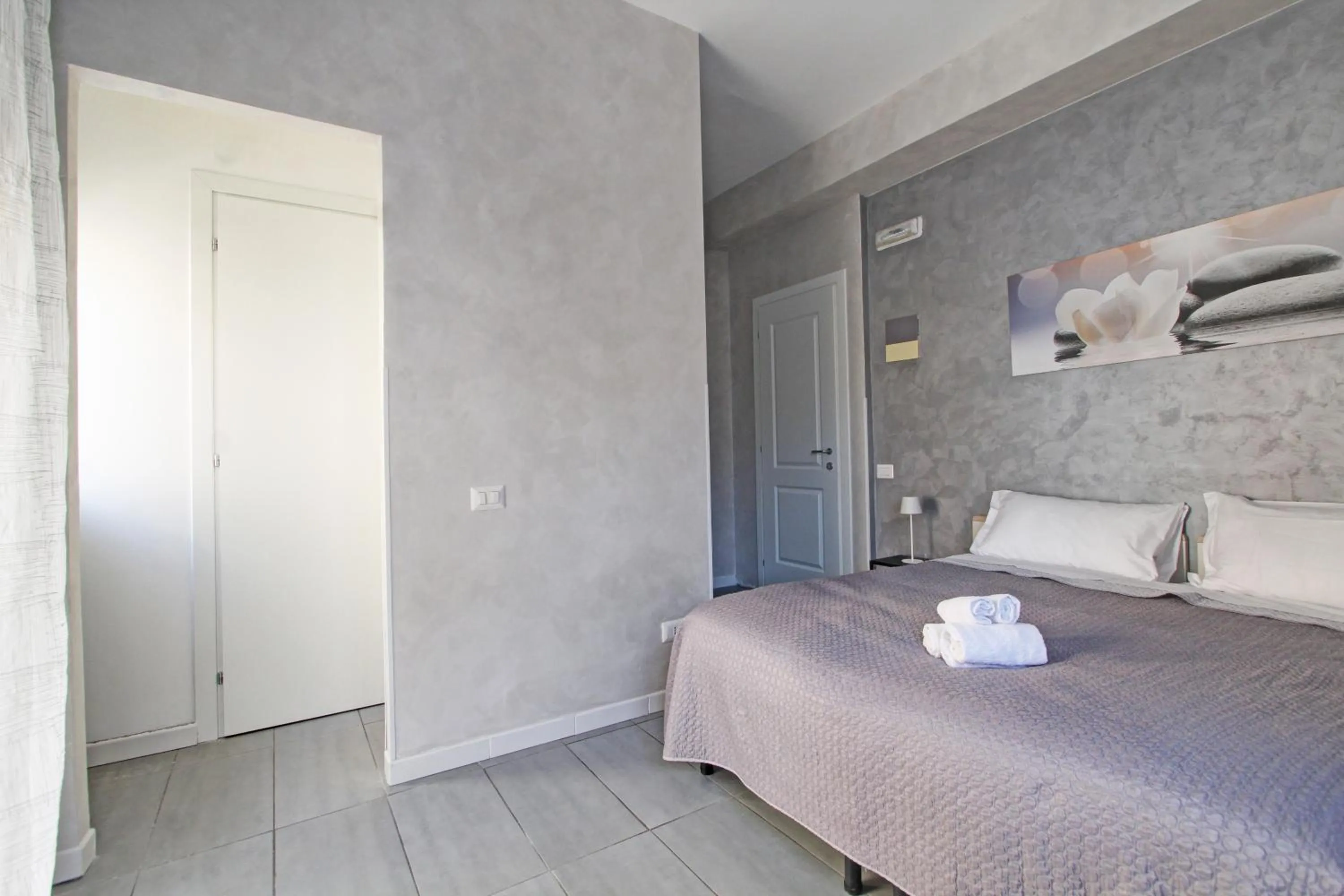 Bed in Vatican Central Suites