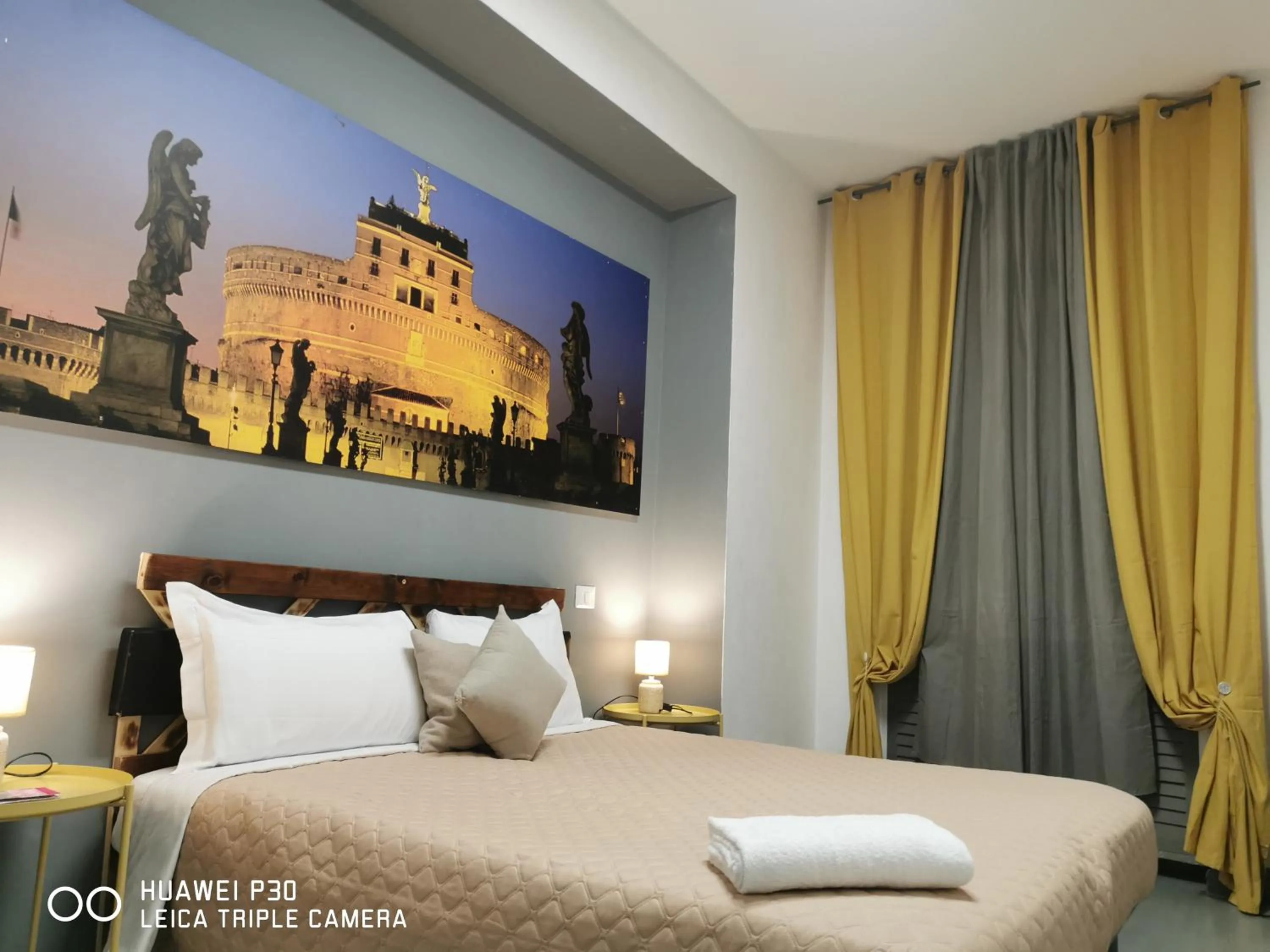 Bed in Vatican Central Suites