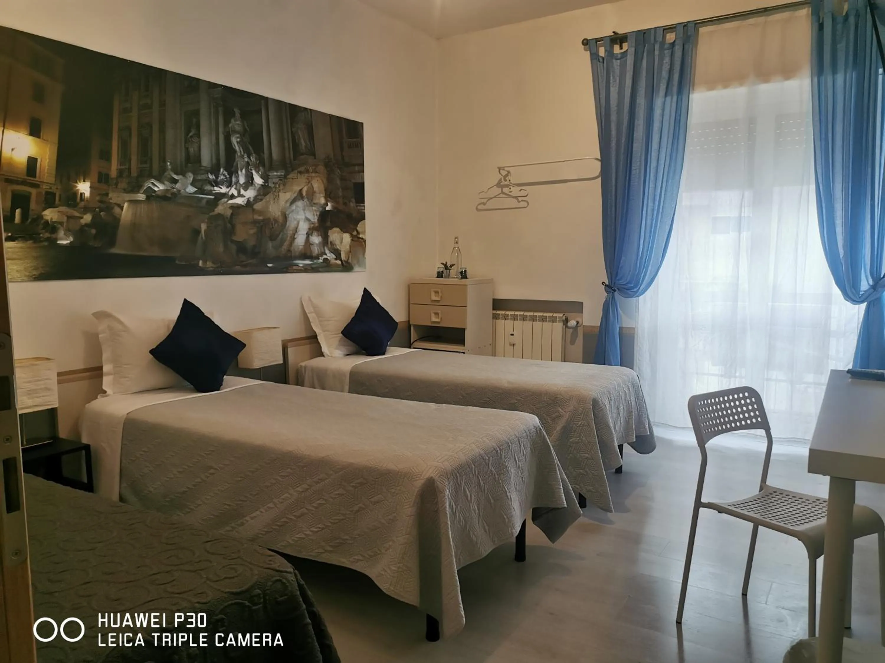 Family Room with Private Bathroom in Vatican Central Suites