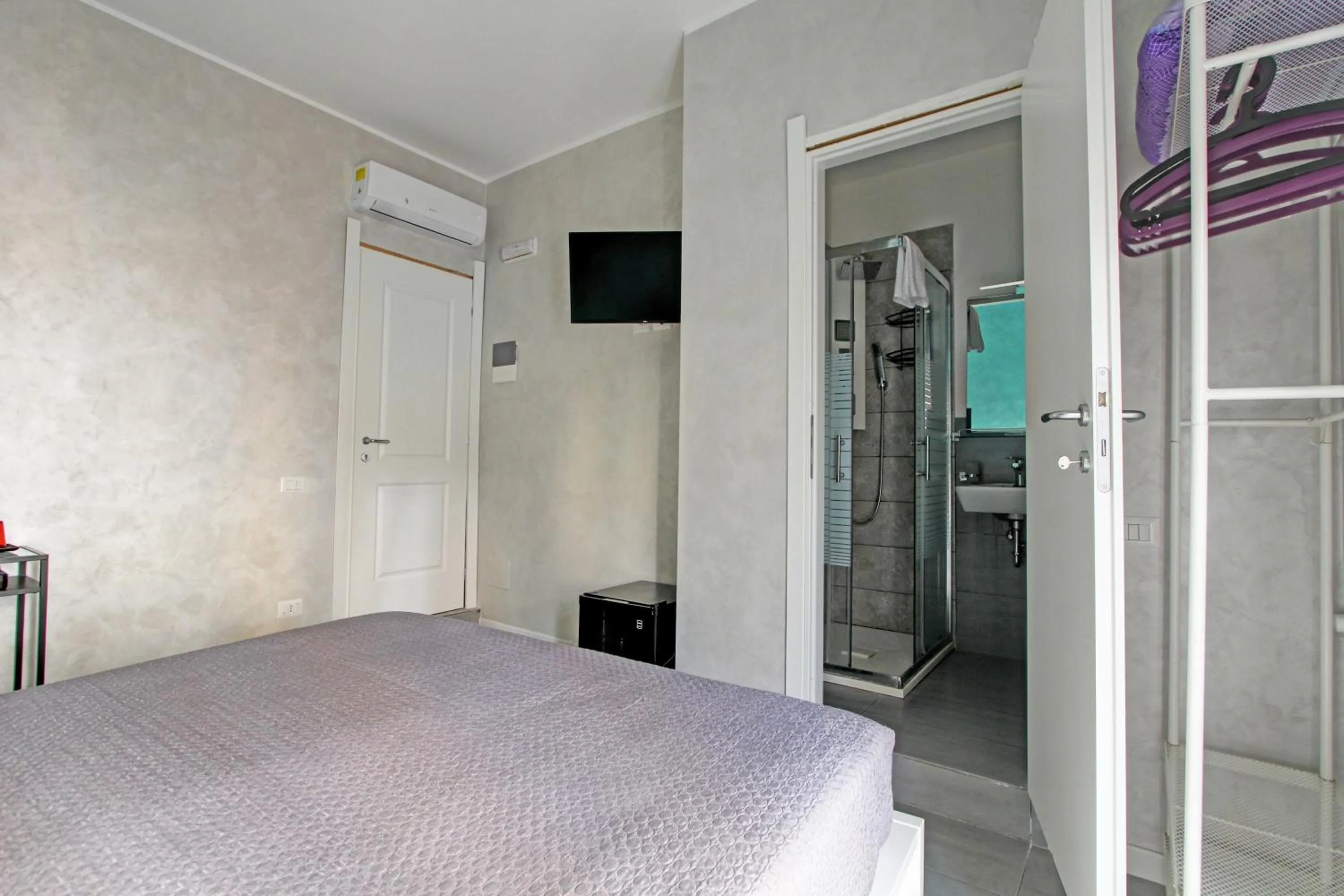 Bed in Vatican Central Suites