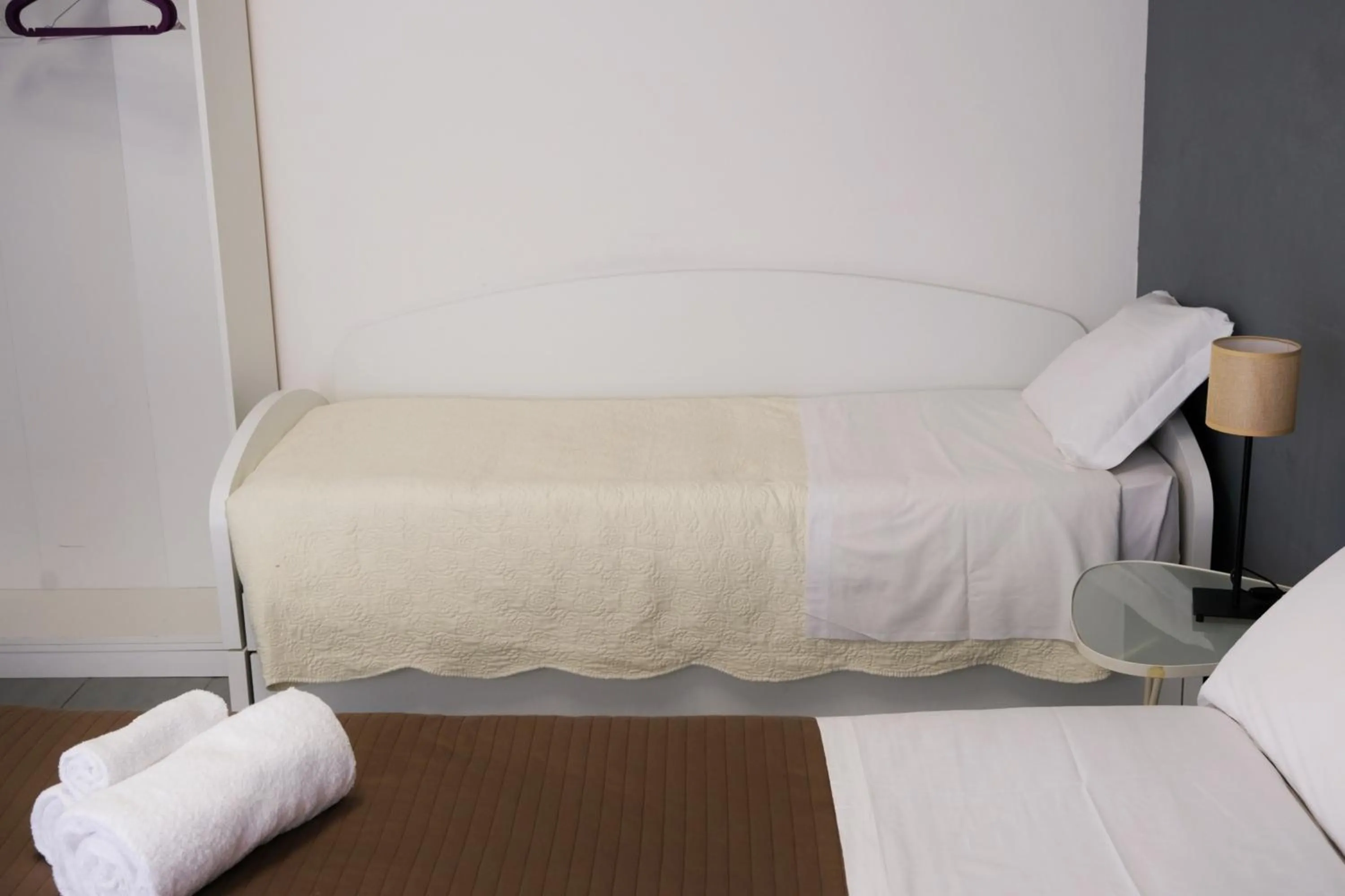 Bed in Vatican Central Suites