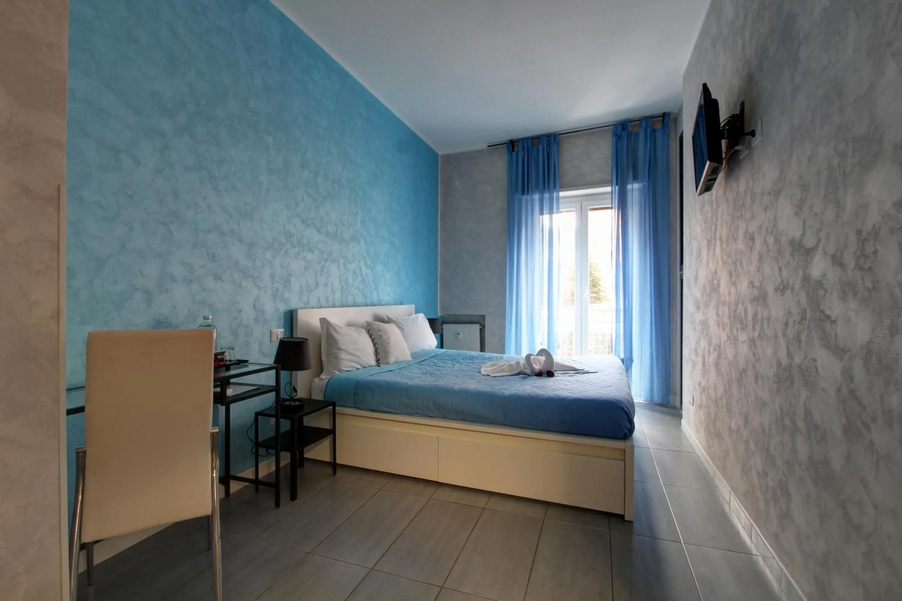 Bed in Vatican Central Suites